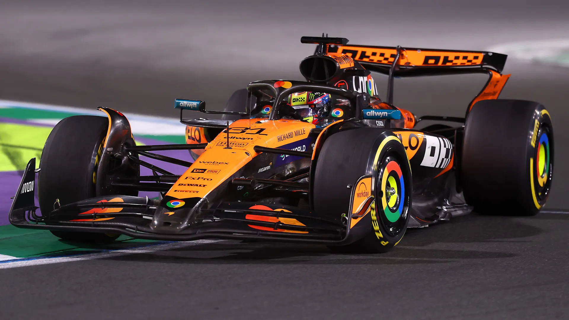 McLaren Driver Oscar Piastri Speeds Down Straight at Silverstone