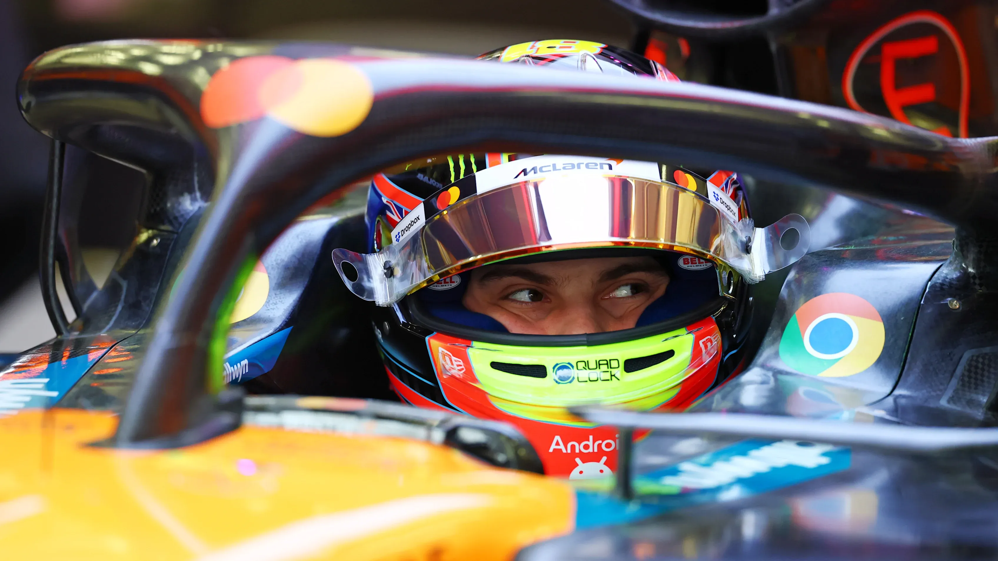 Oscar Piastri Analyzes Performance Data in McLaren Garage