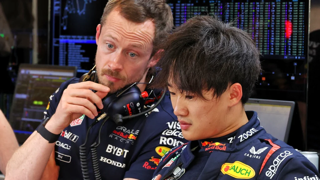 Yuki Tsunoda Discusses Strategy with Team Engineers