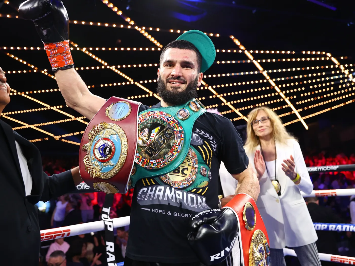 Artur Beterbiev with Belts