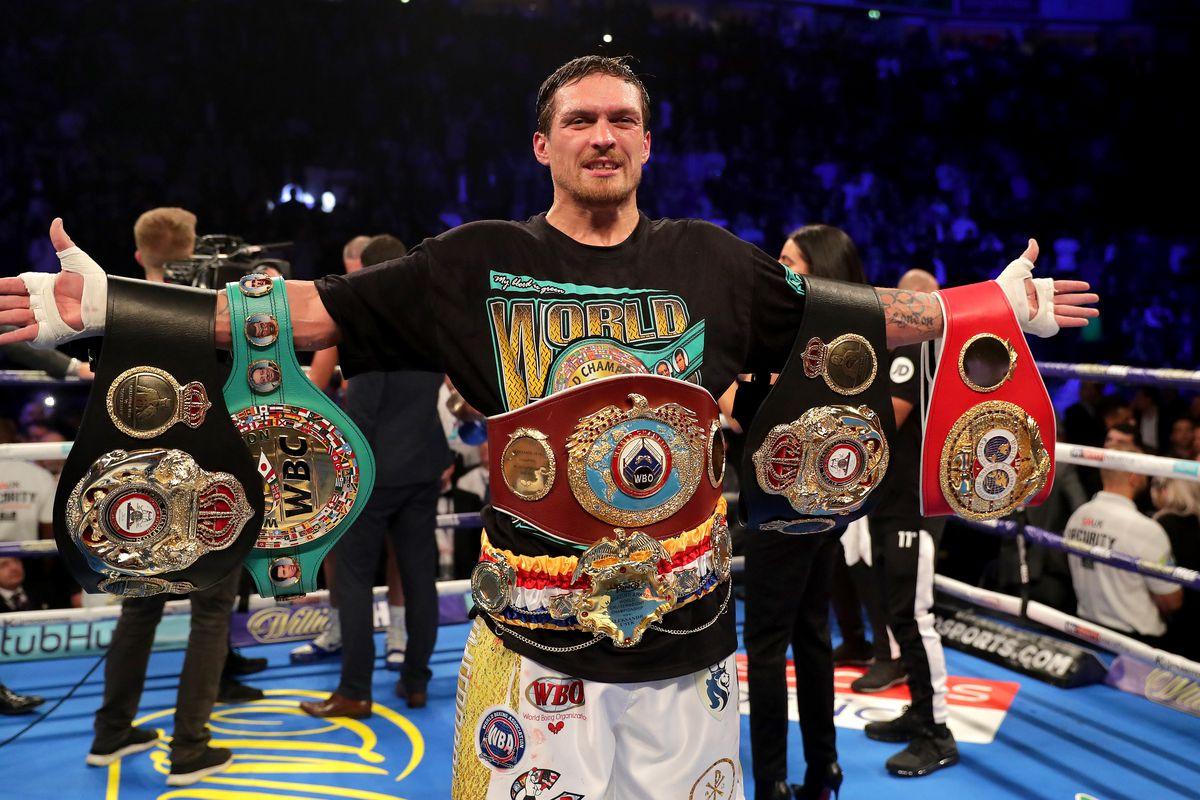 Oleksandr Usyk With World Championship Belts