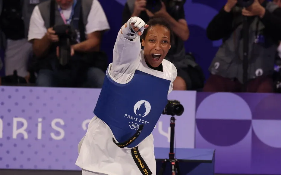 Althea Laurin Pointing to Fans After Taekwondo Victory