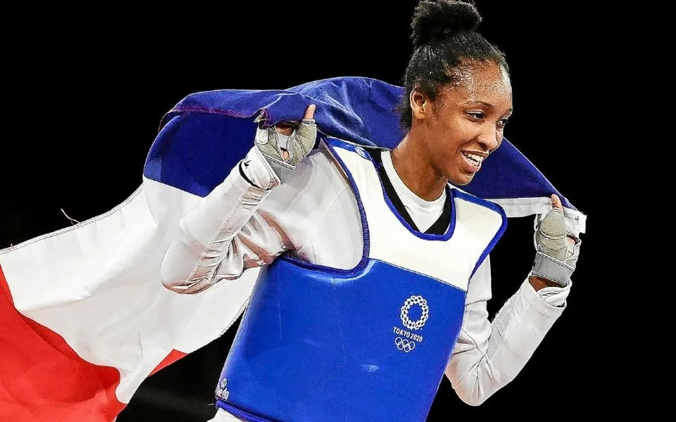 Althea Laurin Holding French Flag After Taekwondo Triumph