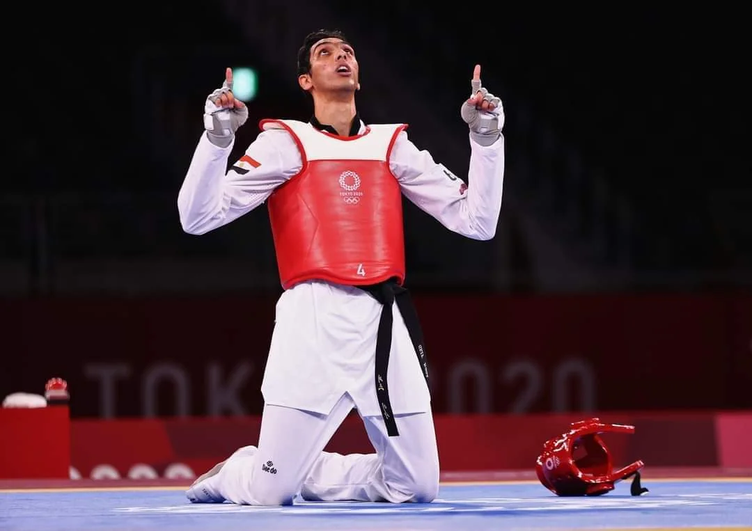 Seif Eissa Celebrating Victory in Red Gear at Tokyo Olympics