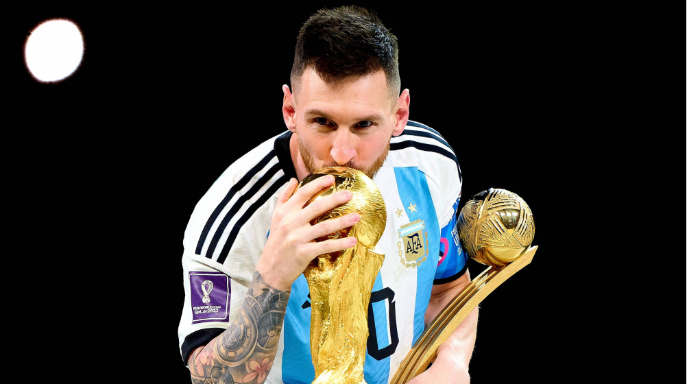 Lionel Messi Kisses World Cup Trophy in Iconic Moment