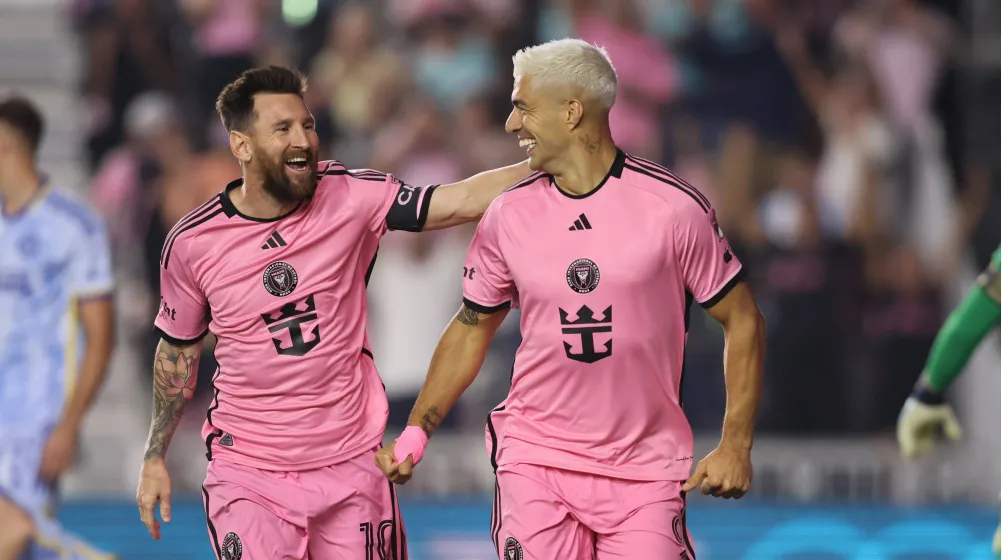 Luis Suarez and teammate share a laugh in Inter Miami kit