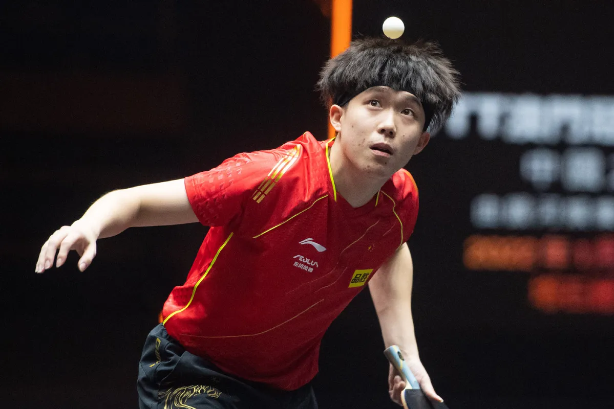 Wang Chuqin Executes Powerful Forehand Shot