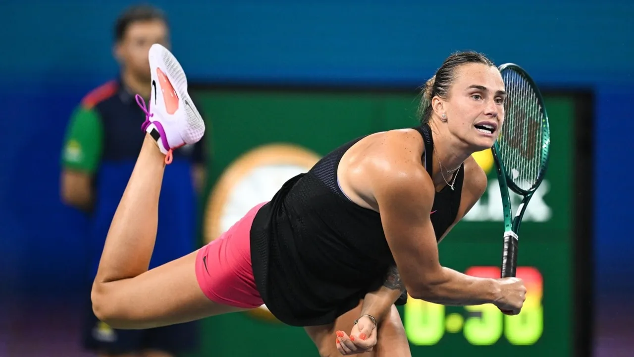 Aryna Sabalenka Dives for a Return Shot