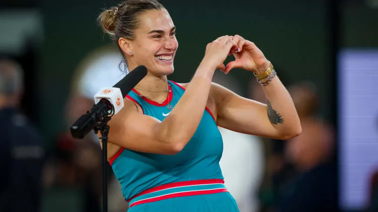 Aryna Sabalenka Waves to the Tennis Crowd