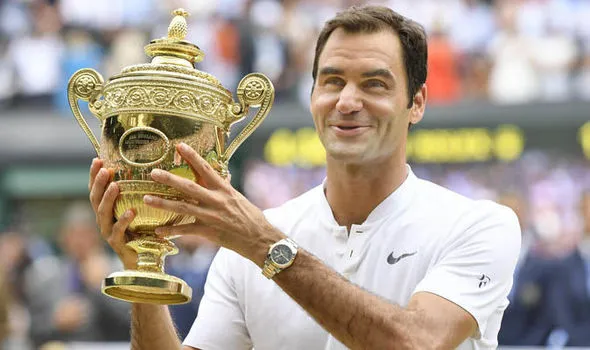 Federer Holding Wimbledon Trophy