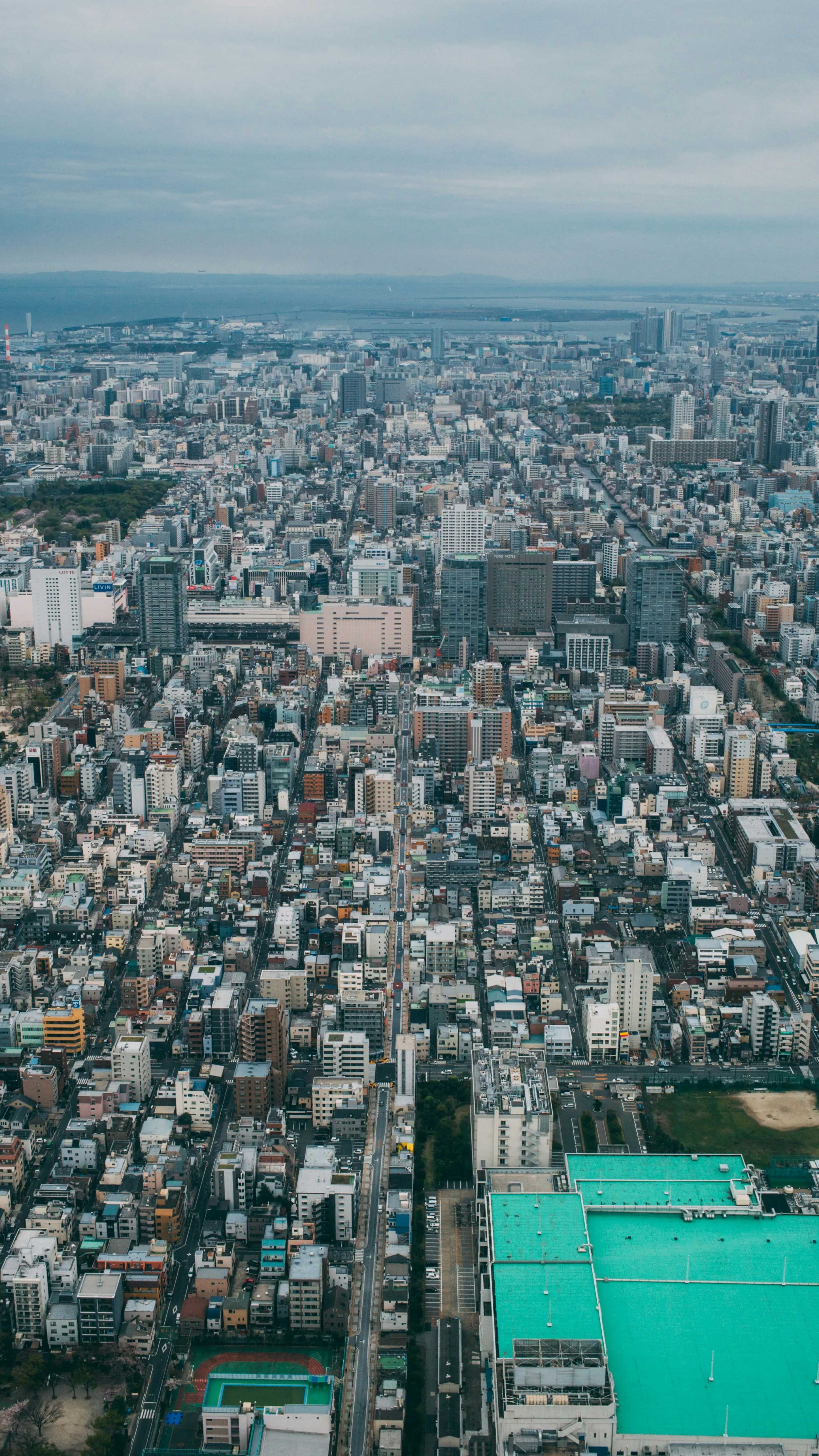 Aerial City View Capturing Urban Skyline in Blue Wallpaper