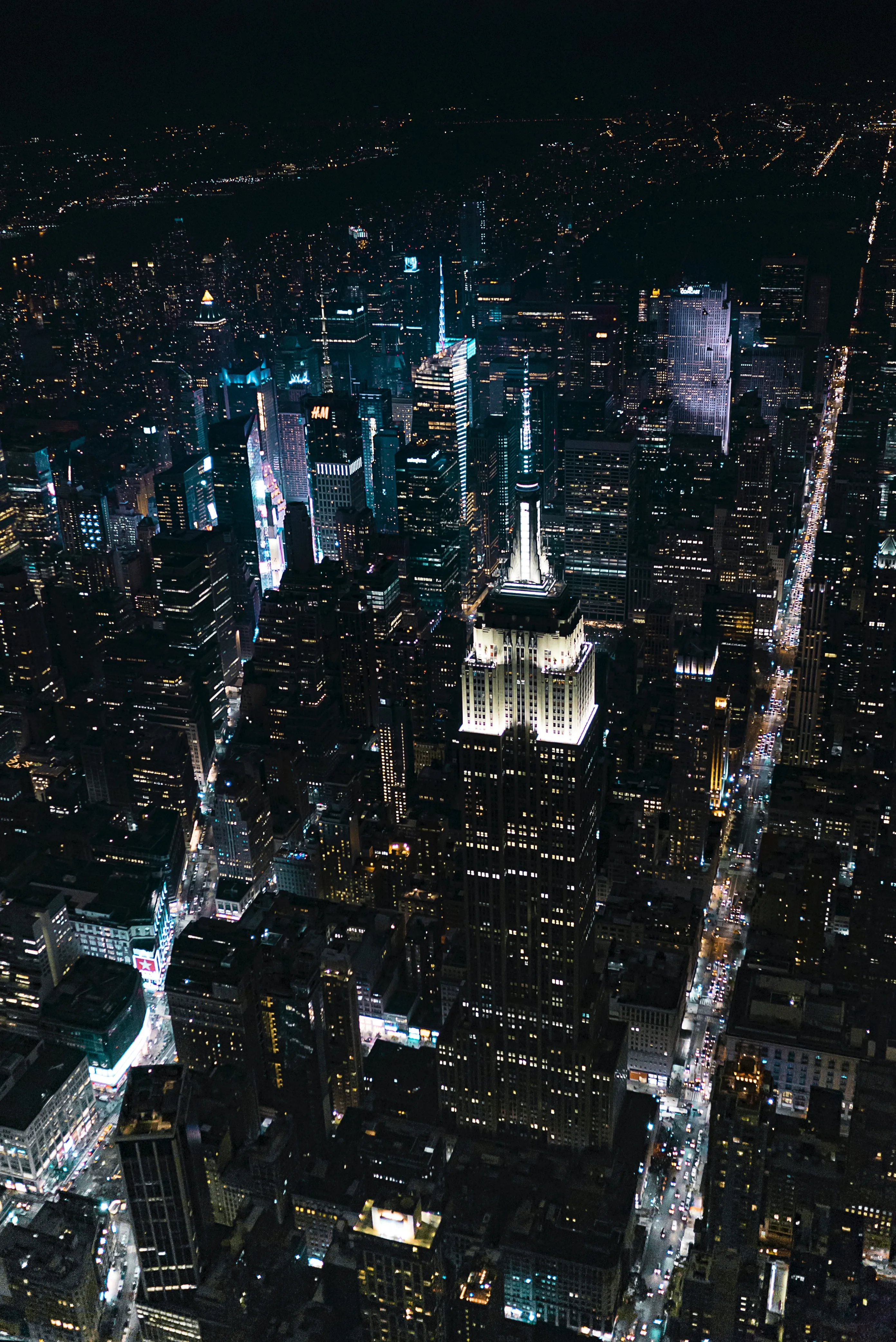 Aerial Night View of Skyscrapers and City Lights Wallpaper