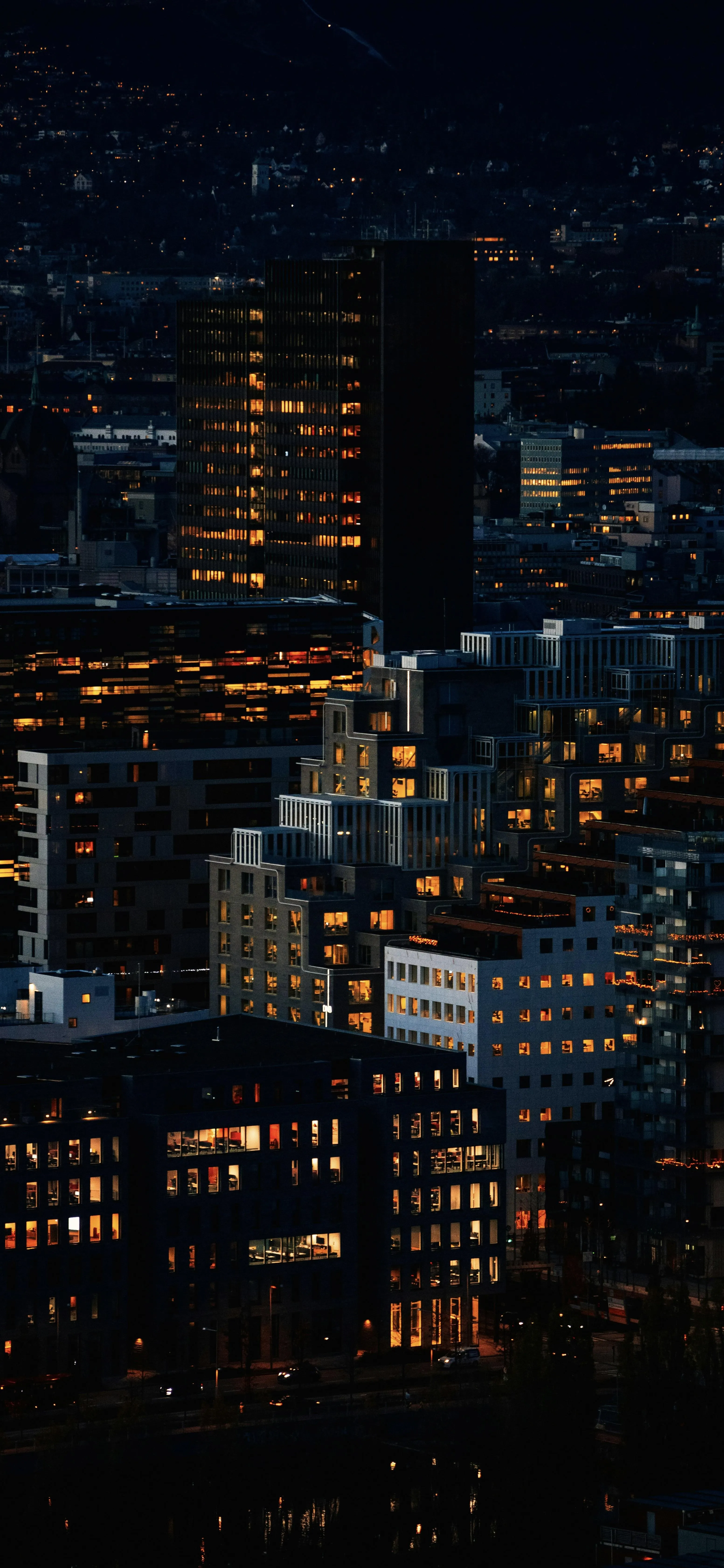 Aerial Night View of Urban City Buildings and Lights