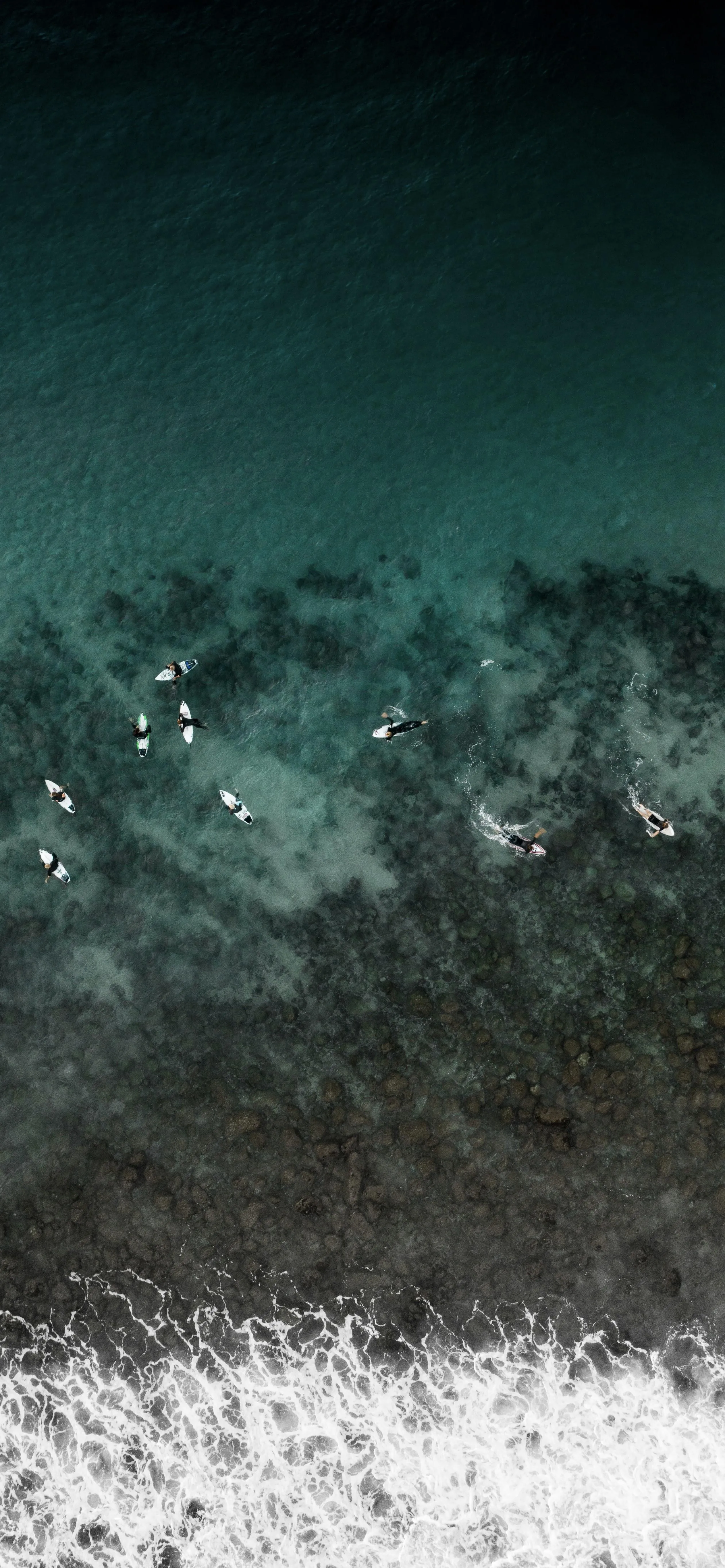 Aerial View of Beach with Dark and Light Water Mixing