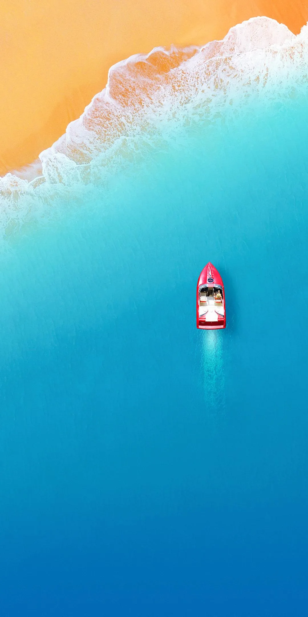 Aerial View of Boat in Crystal Blue Tropical Sea Wallpaper