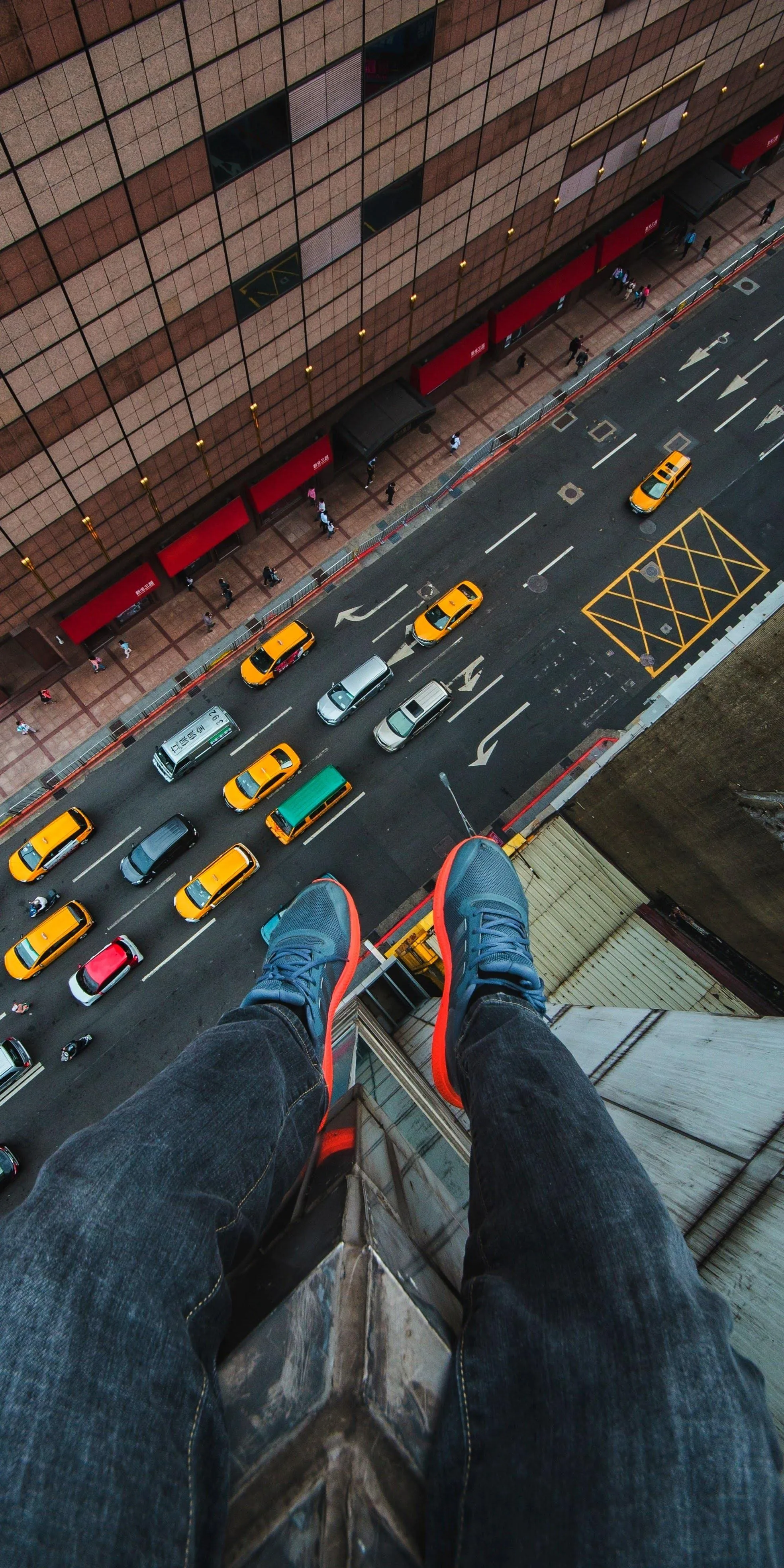 Aerial View of Busy City Street with Colorful Cars Moving