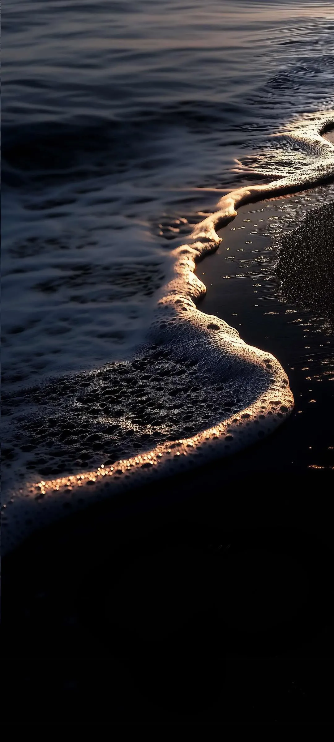 Aerial View of Ocean Waves Crashing on Black Sand Wallpaper