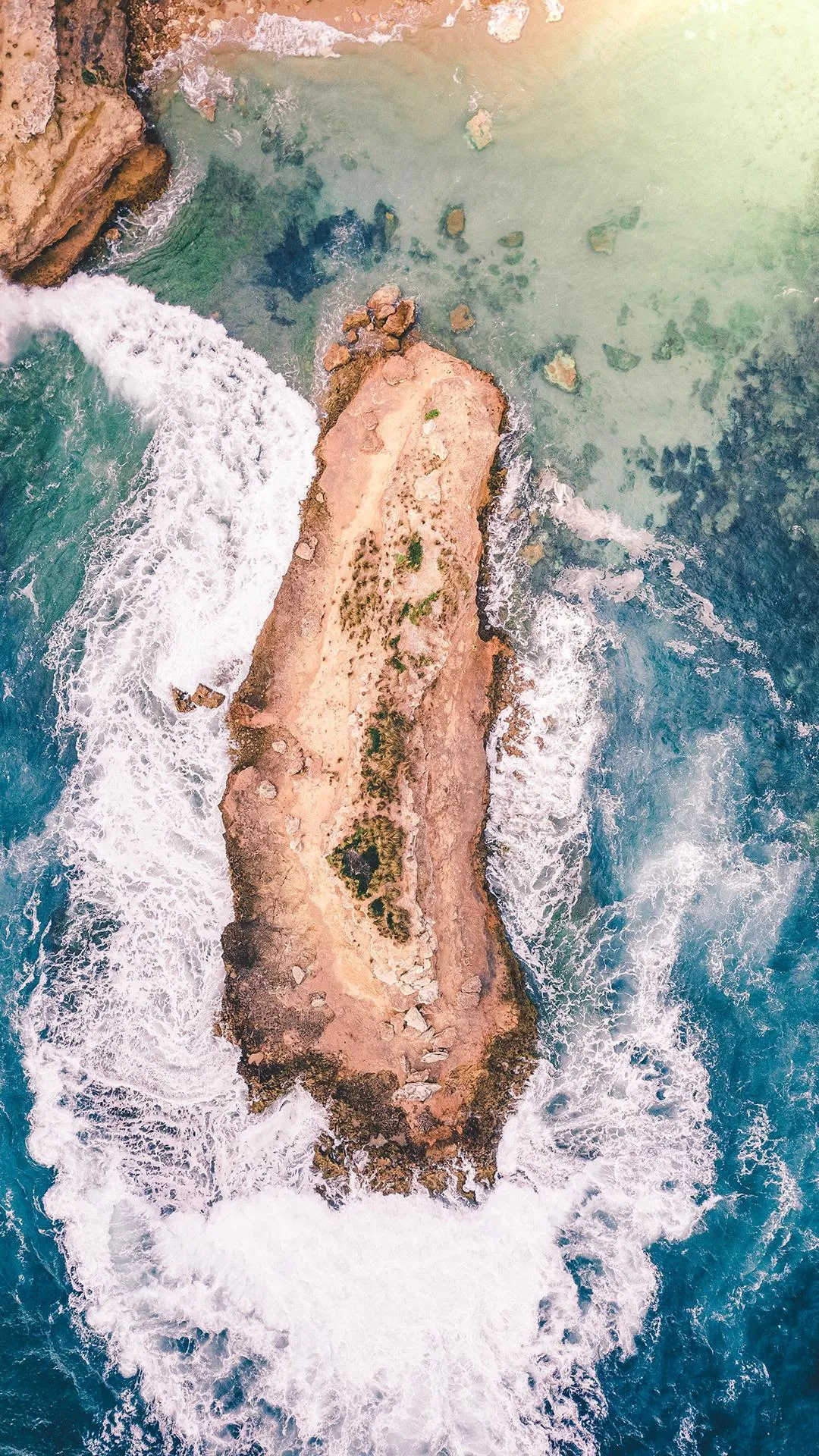 Aerial View of Small Island Surrounded by Turquoise Sea HD