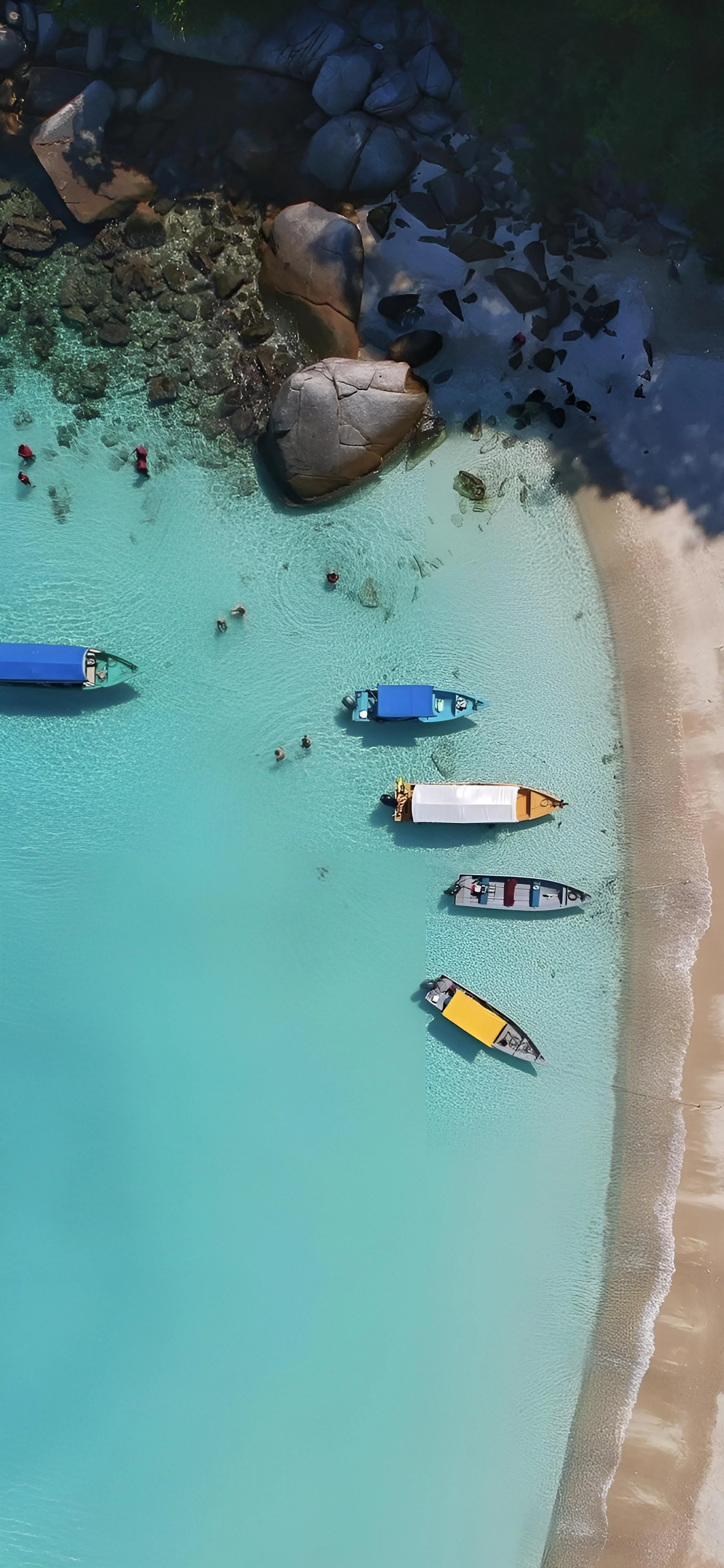 Aerial View of Tropical Beach with Boats on Turquoise Water