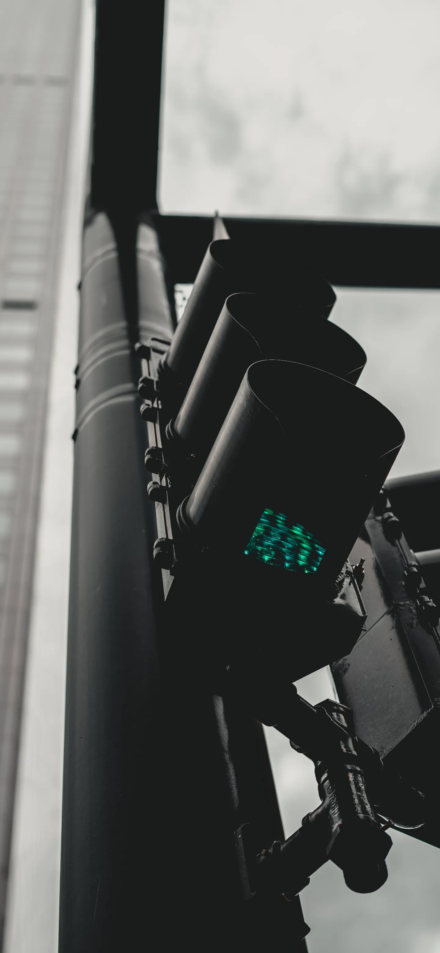 Artistic Black and White Image of a Traffic Light Urban Scene