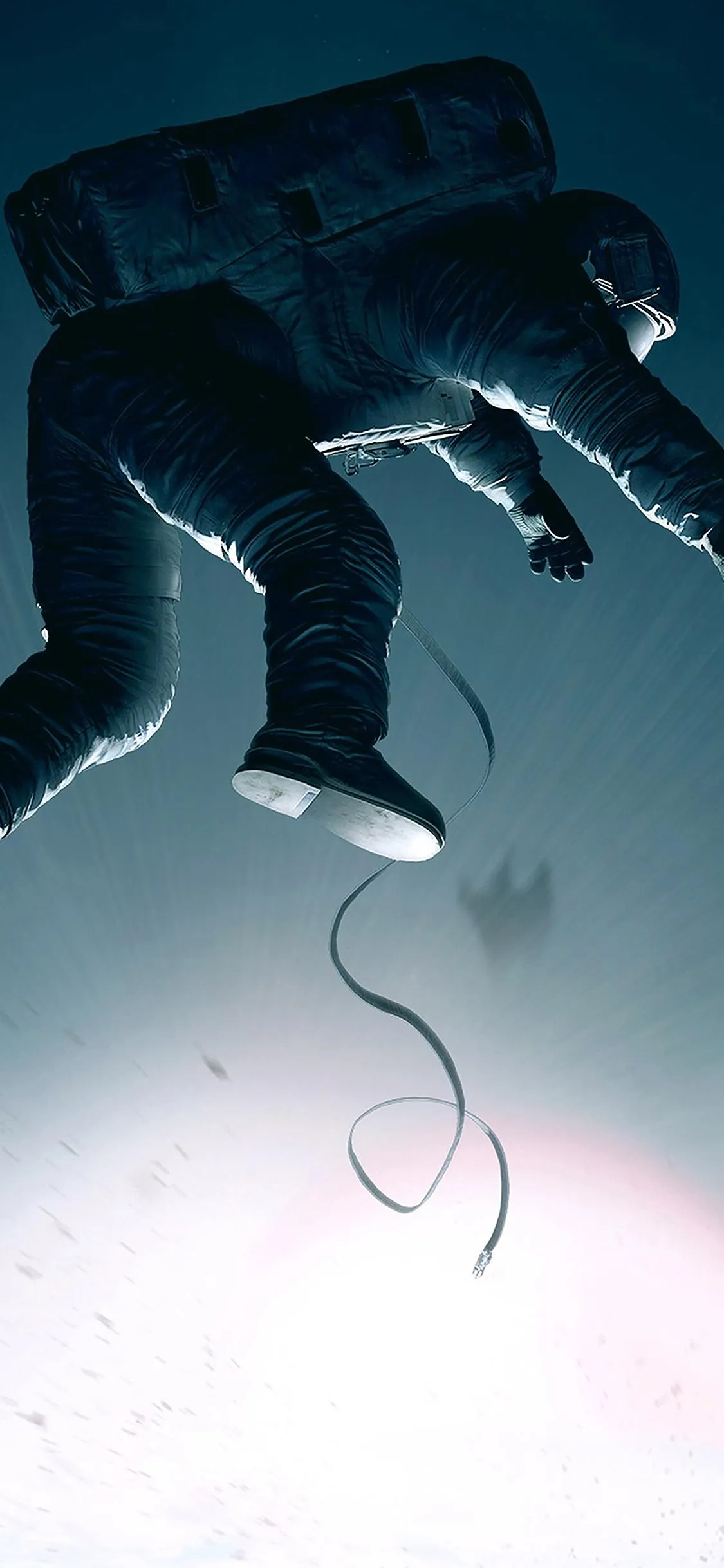 Astronaut Floating Alone in Space with Tether Line