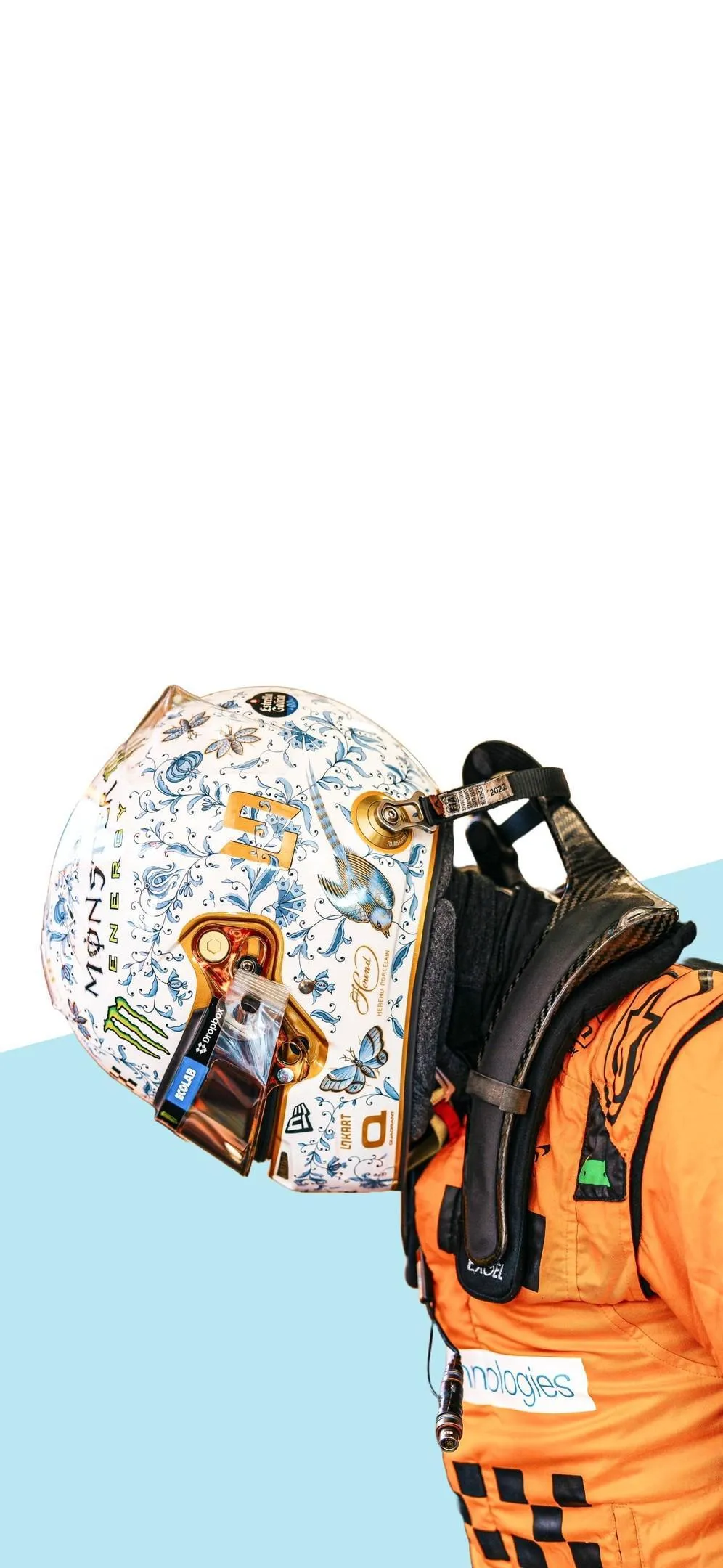 Astronaut in Space Suit Holding Colorful Planets Wallpaper