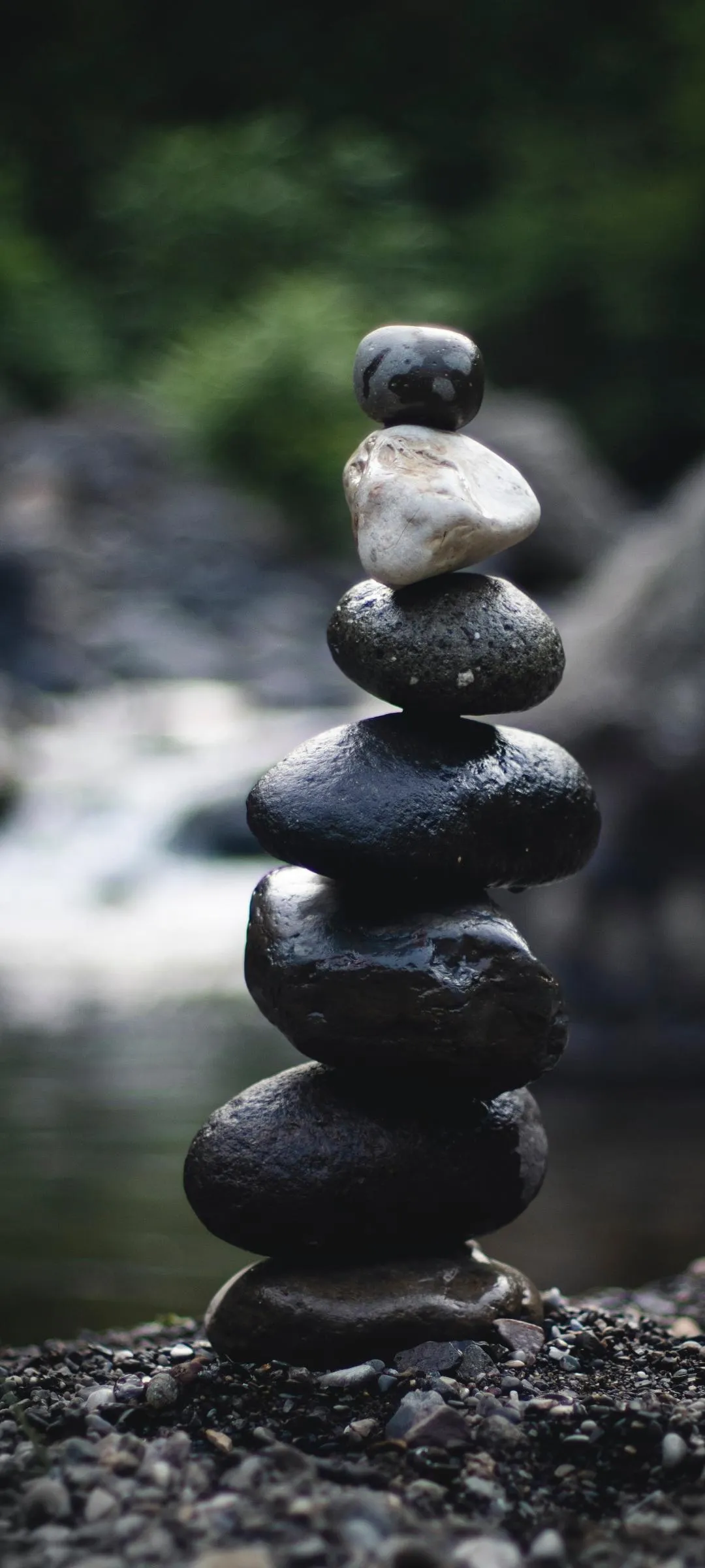 Balanced Zen Stones in Peaceful Garden Setting Wallpaper