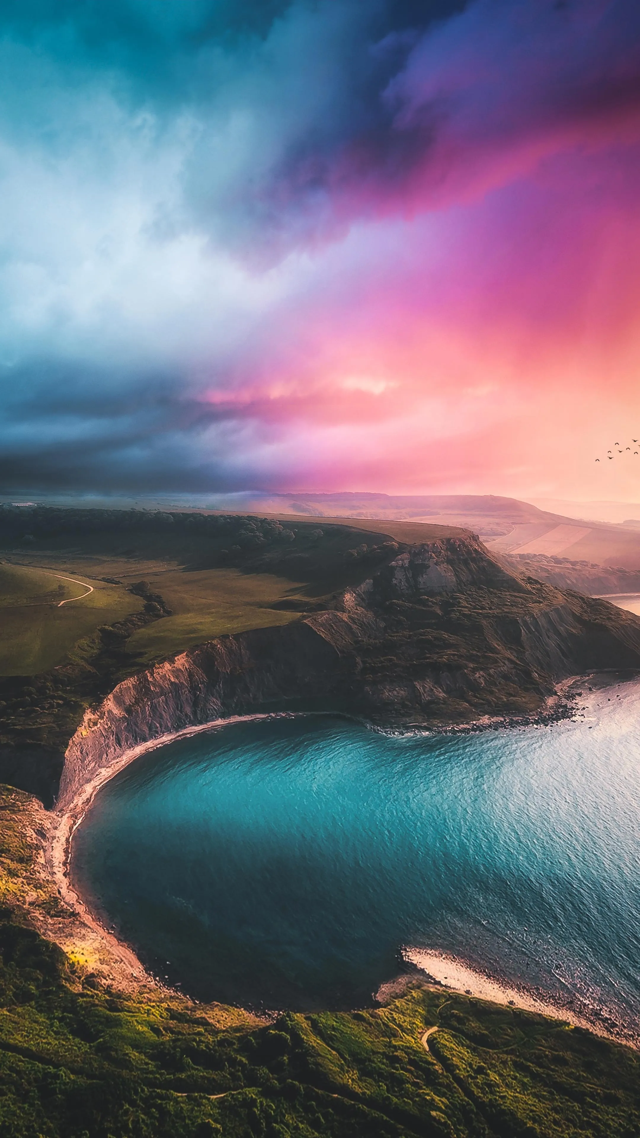 Beautiful Coastline with Pink and Blue Sky at Sunset