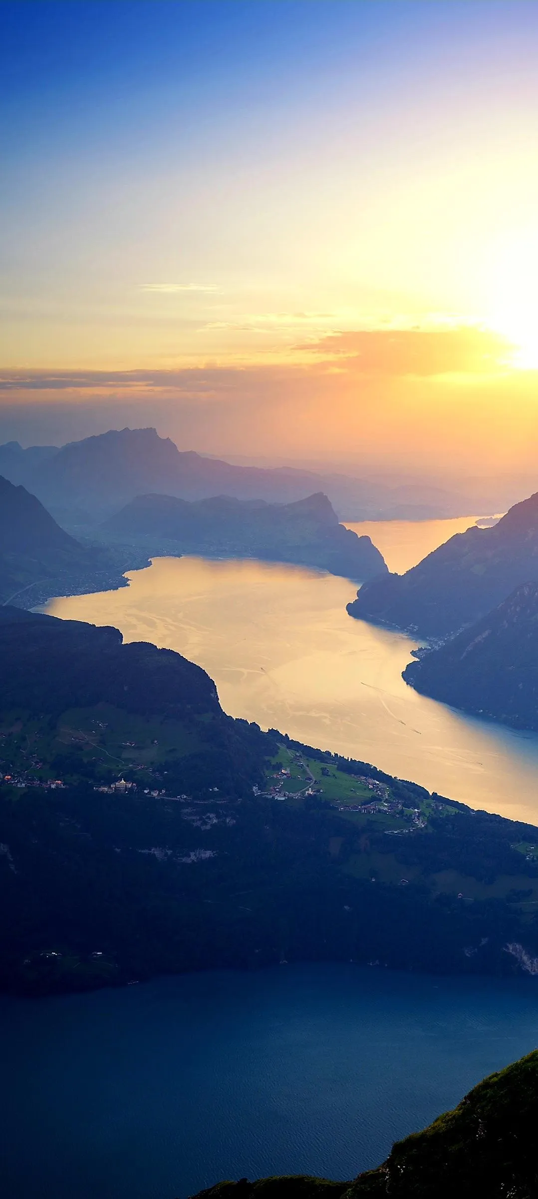 Beautiful Golden Sunset Over Mountain and Ocean Wallpaper