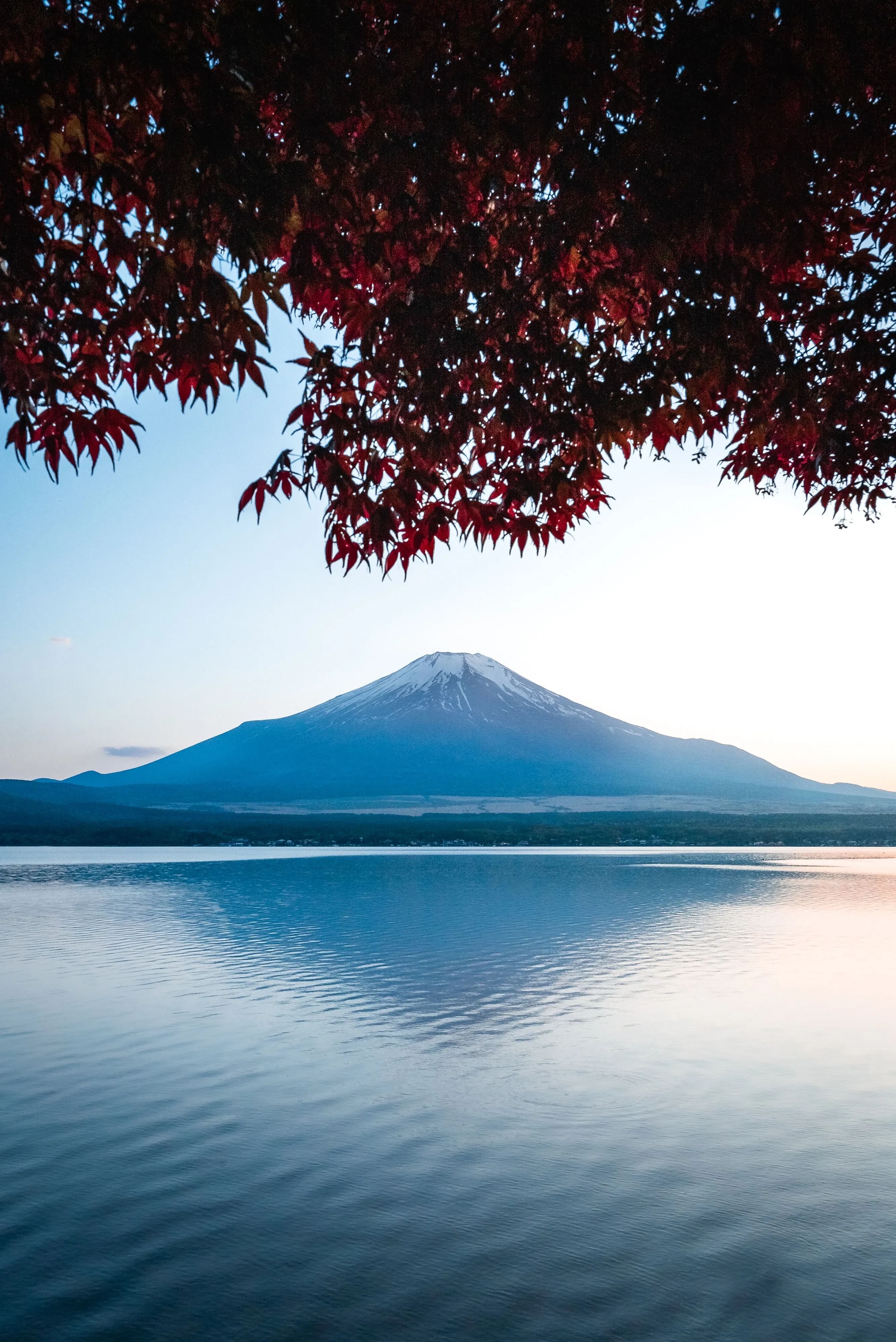 Beautiful Lake with Mountain Reflection Under Blue Sky