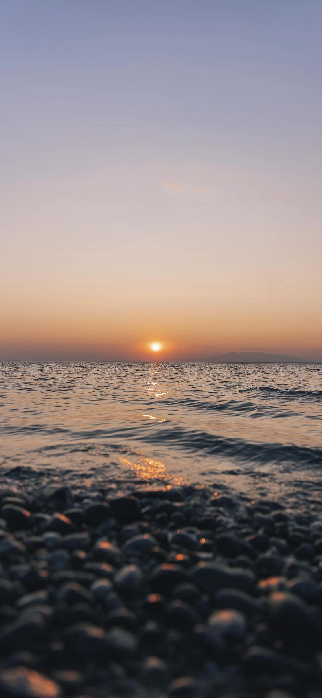 Beautiful Sunrise Over Cloudy Ocean Horizon Wallpaper