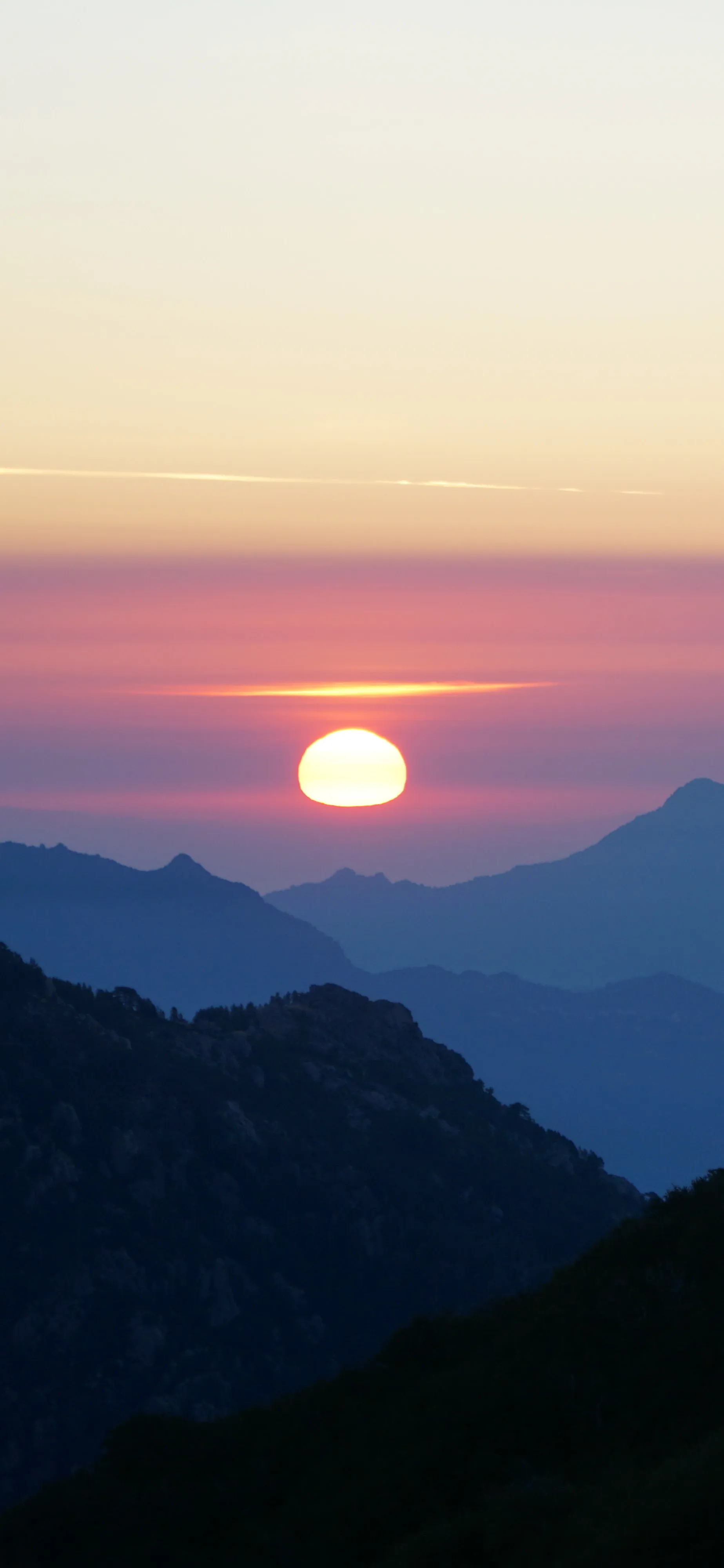 Beautiful Sunset Over Mountain Range with Warm Colors