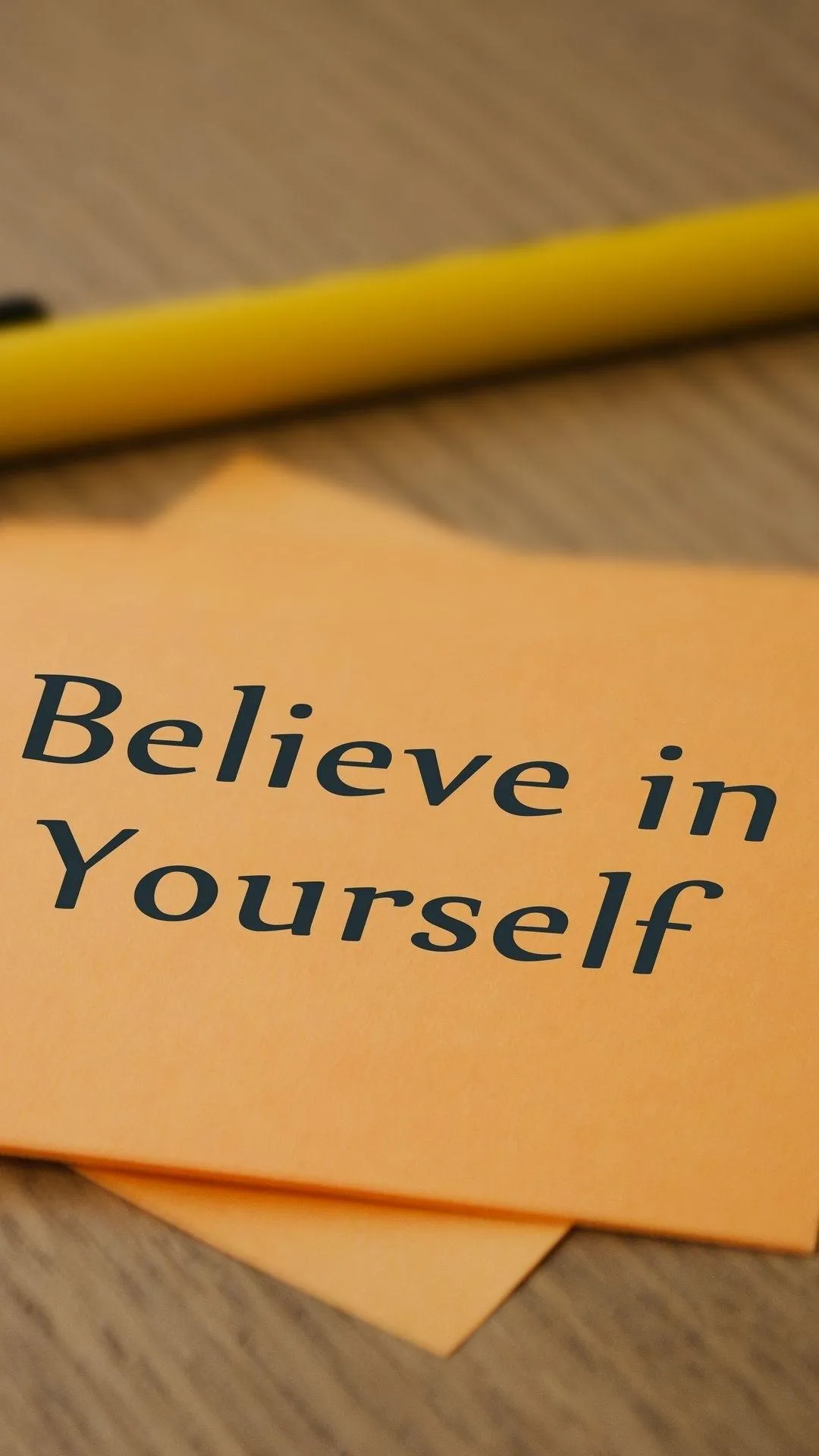 Believe in Yourself Quote on Brown Paper Texture Wallpaper
