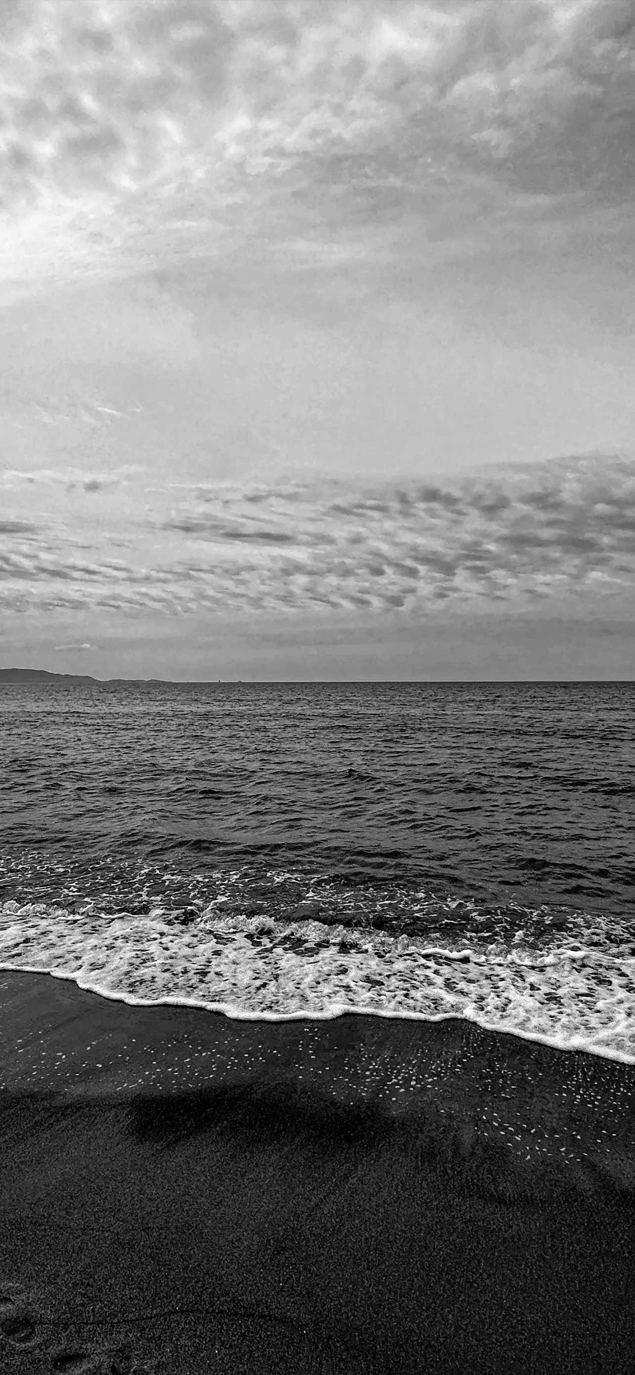 Black and White Beach Shoreline with Ocean Waves Wallpaper