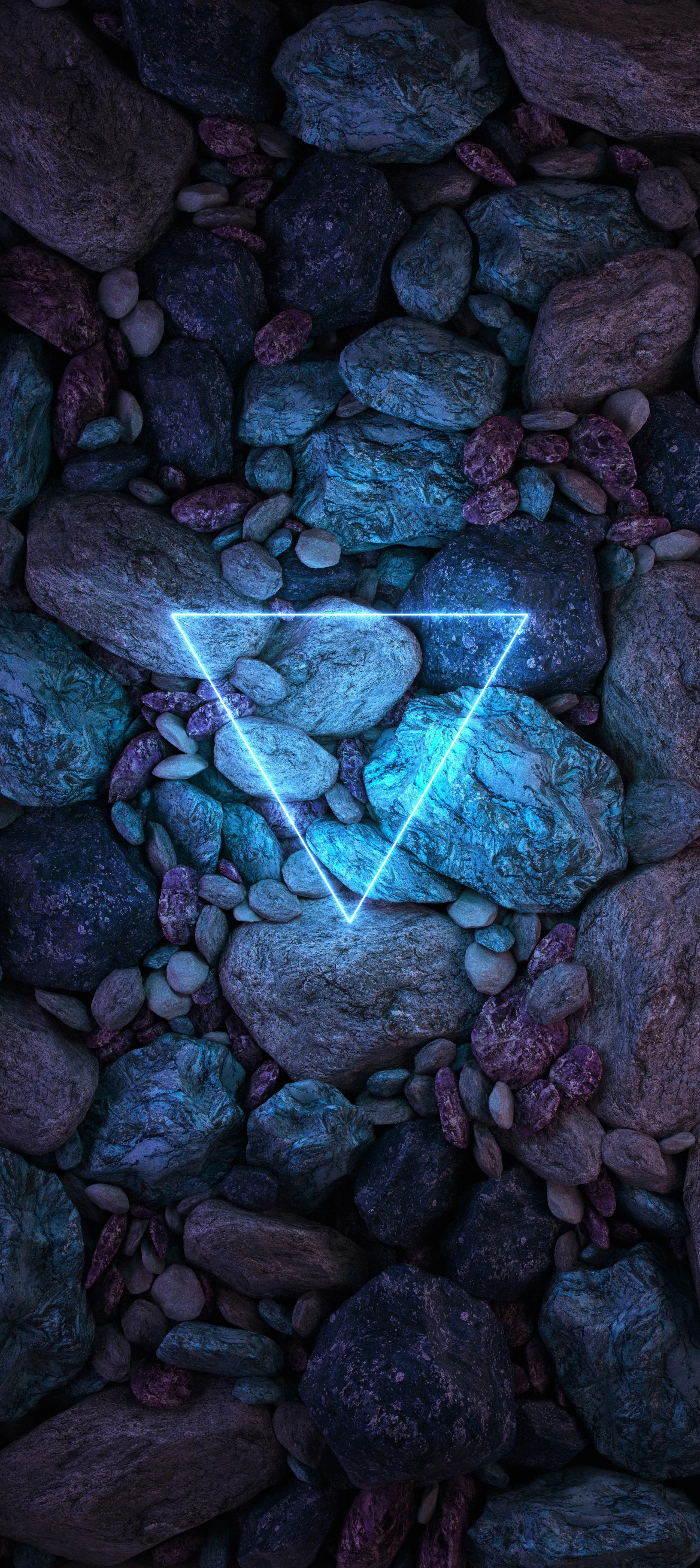 Blue Glowing Geometric Shape Among Dark Rocks Background