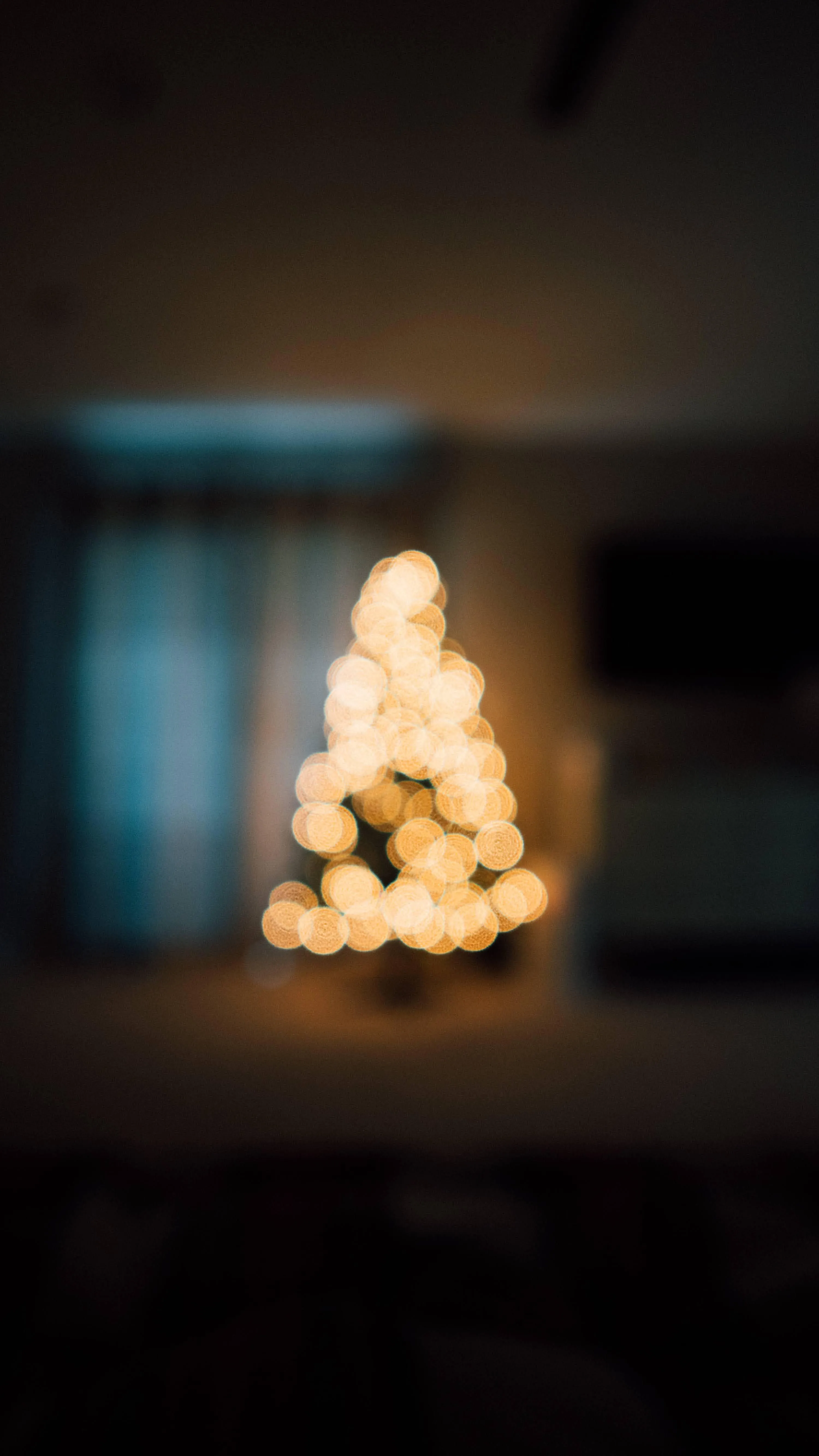 Blurred Christmas Tree with Lights Creating Bokeh Effect