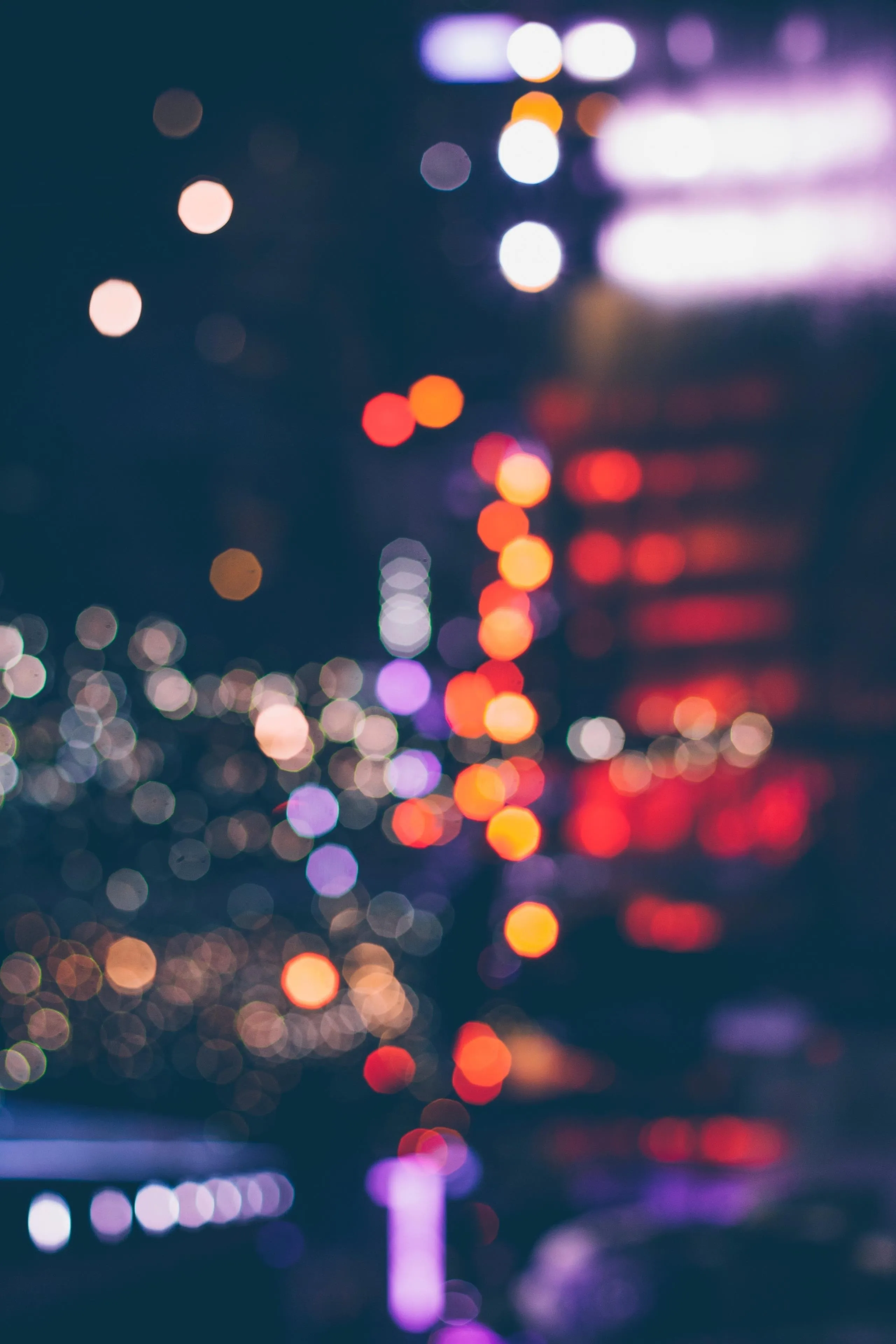 Blurred City Lights at Night with Bokeh Effect Wallpaper