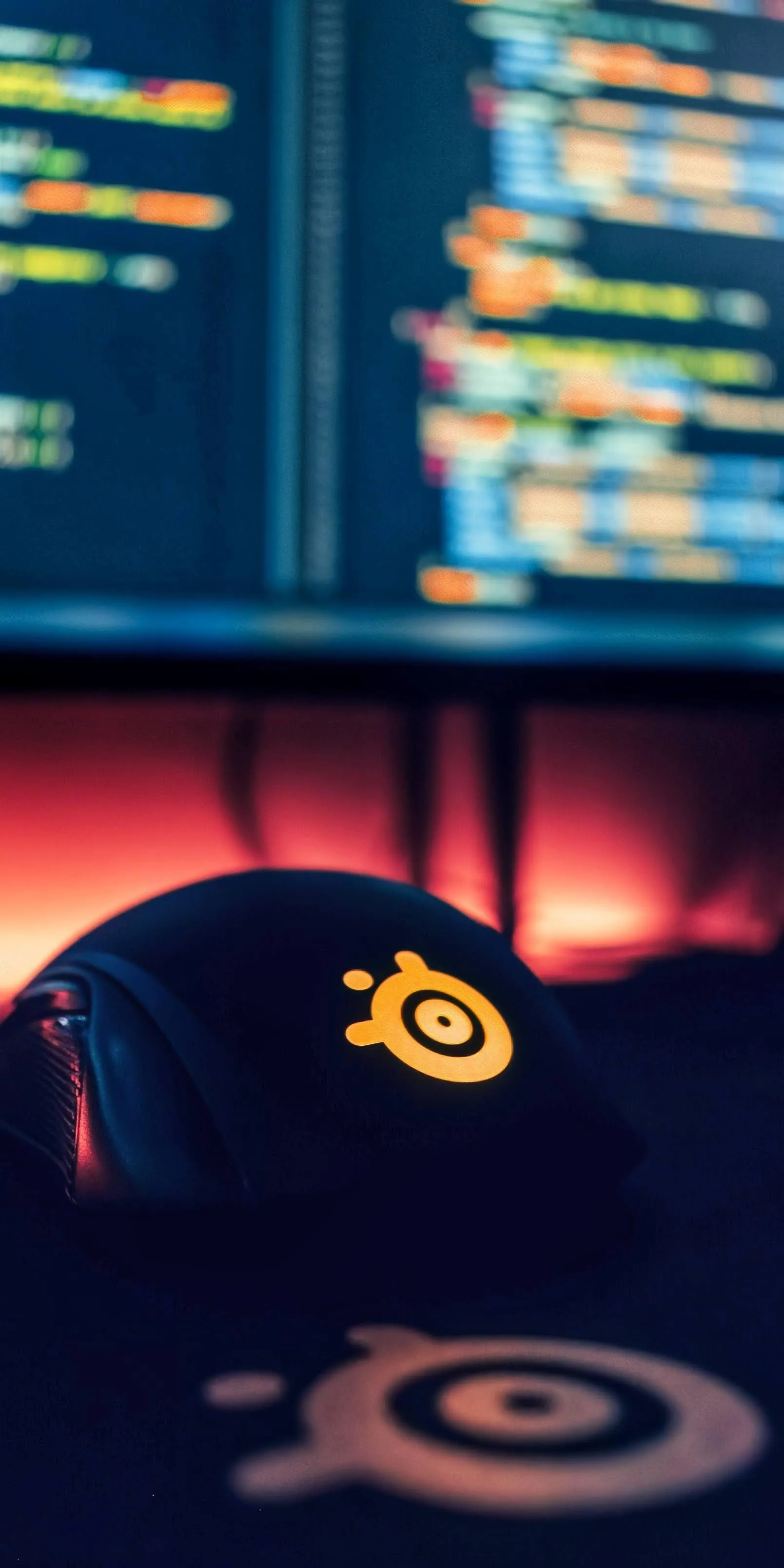 Blurred Dashboard with Speedometer and Neon Lights