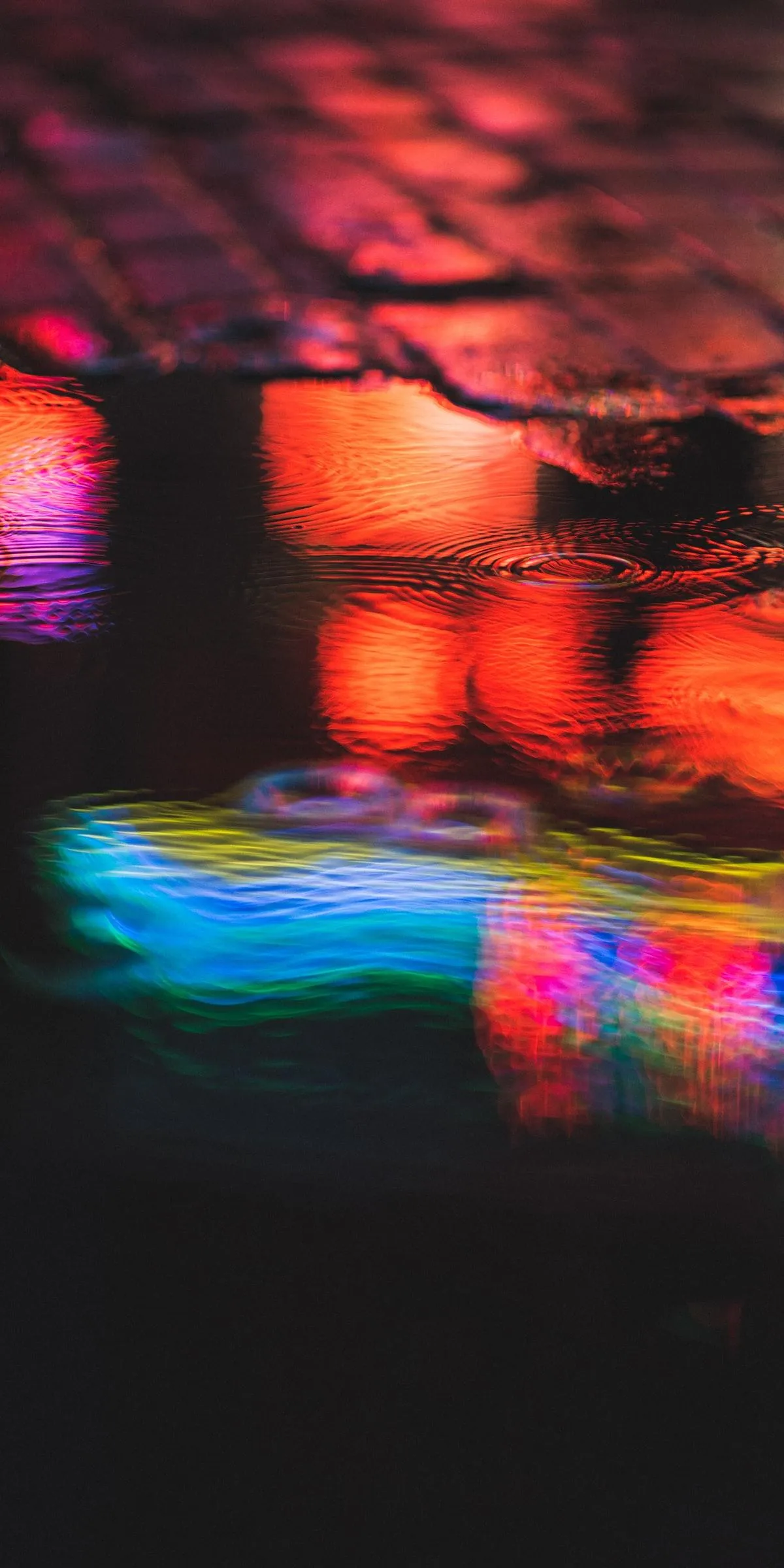 Blurred Neon Lights in a Cityscape at Night Wallpaper