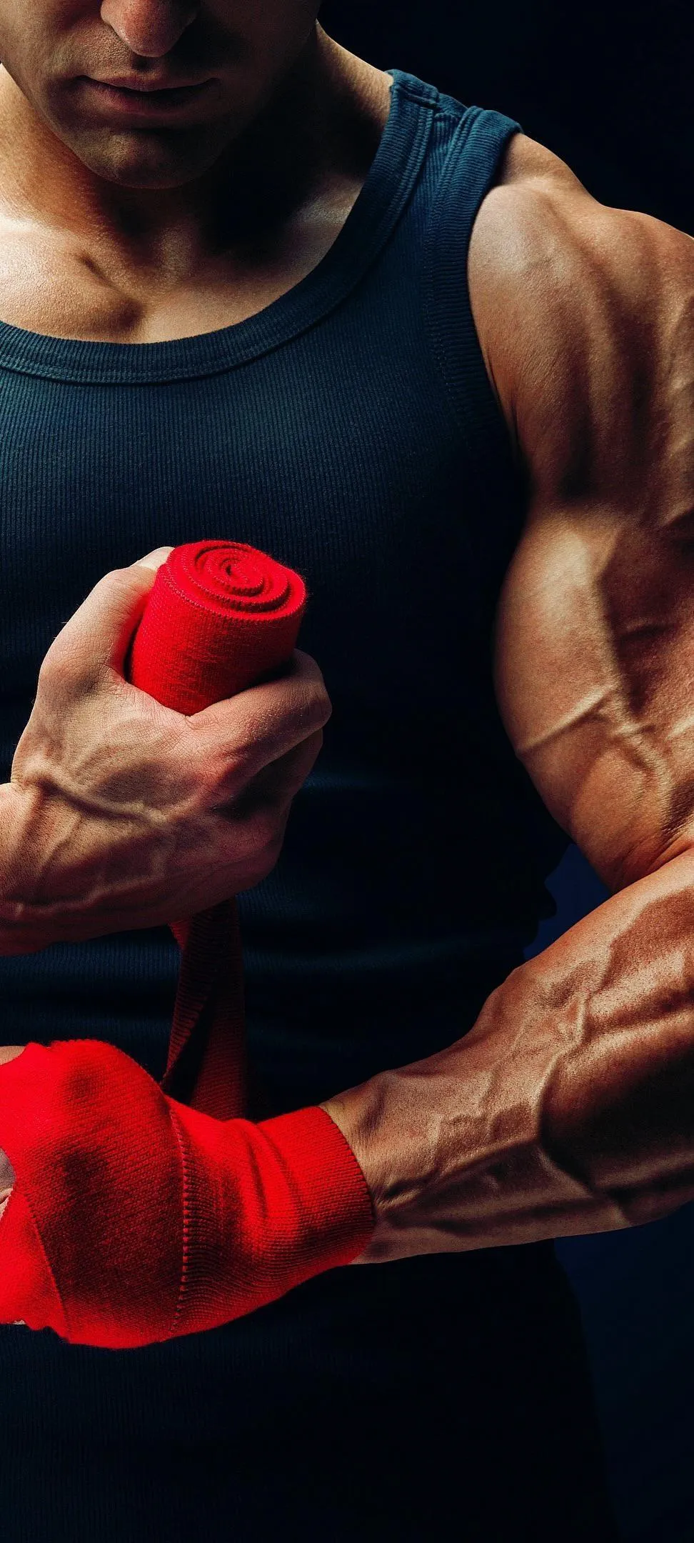 Boxer Wearing Gloves Ready for Match in Intense Closeup