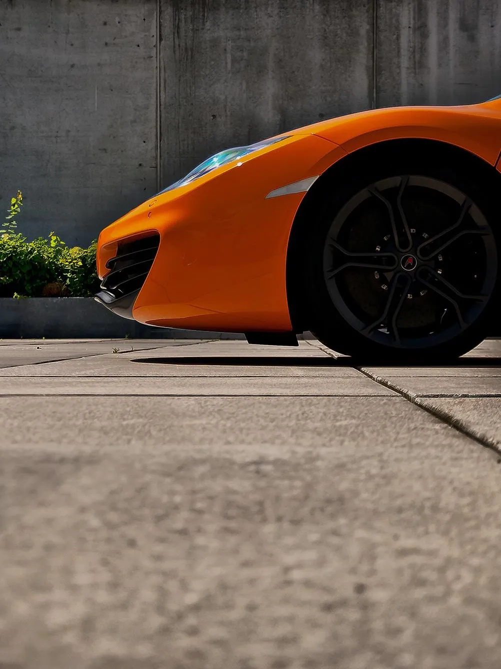 Bright Orange Supercar Parked Street Photography Wallpaper