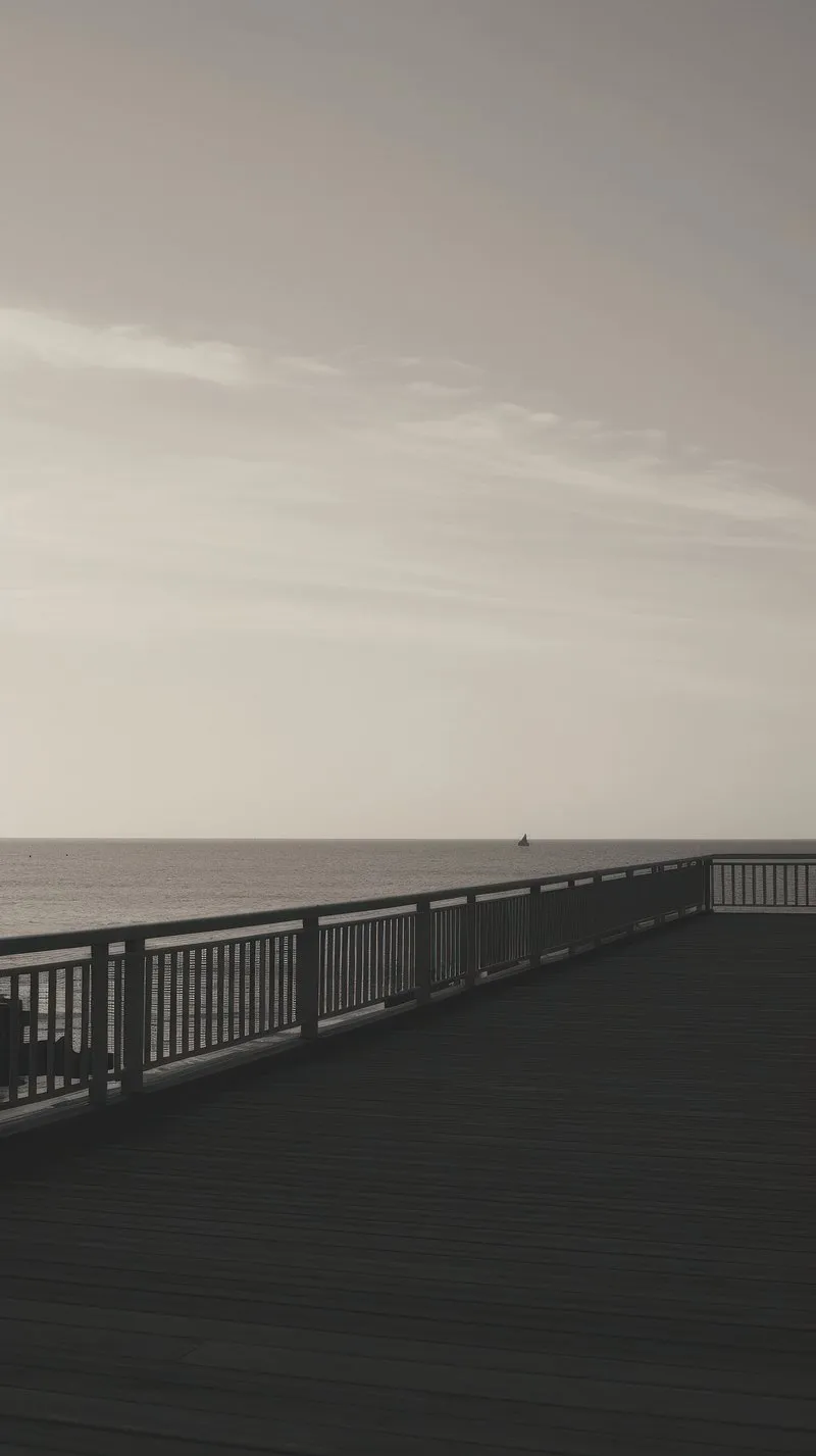 Calm Empty Boardwalk Reaching into a Quiet Foggy Morning