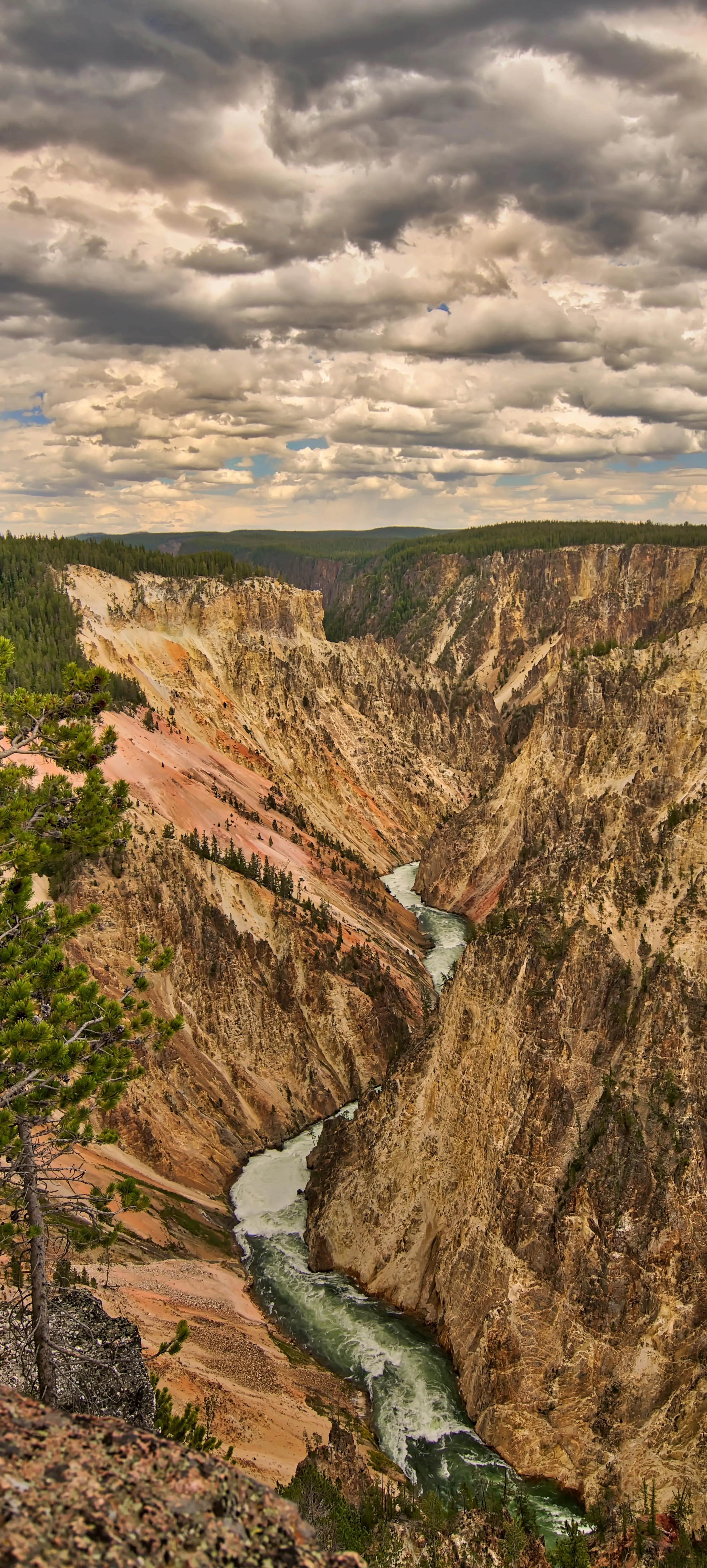 Canyon with River Flowing Through Rocky Landscape Wallpaper