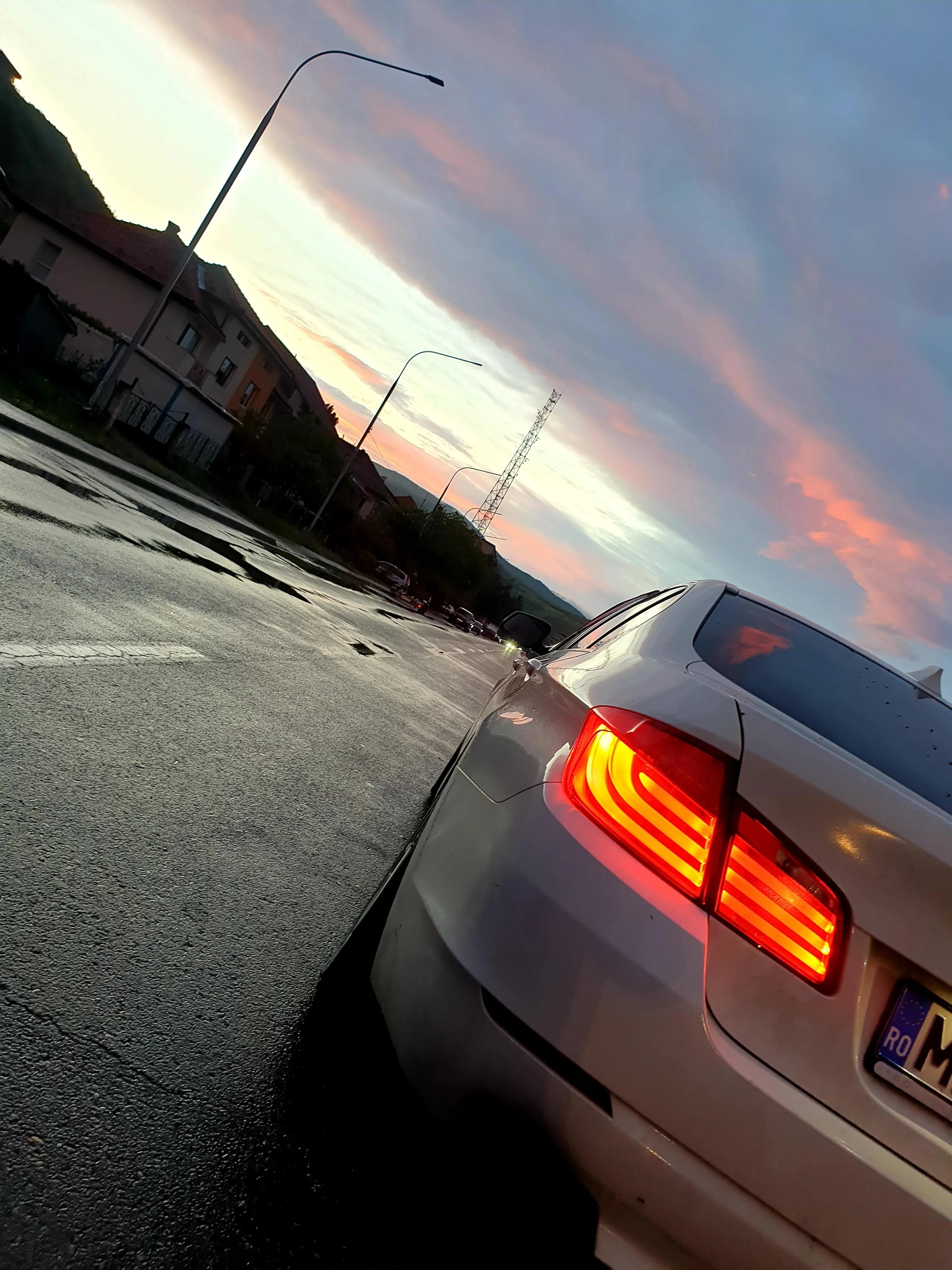 Car Tail Lights on Road During Colorful Sunset Wallpaper