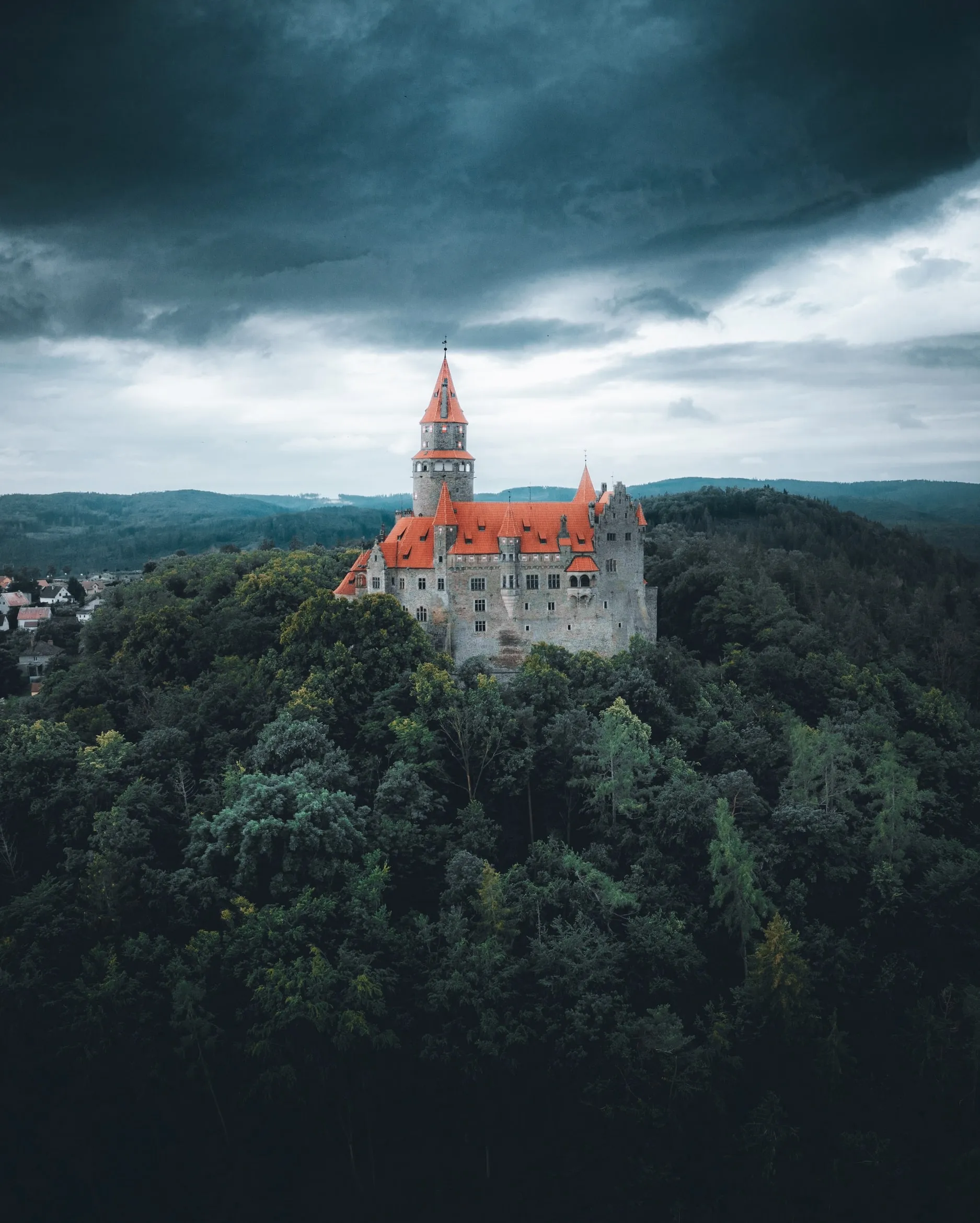 Castle on Mountain Surrounded by Misty Forest Wallpaper