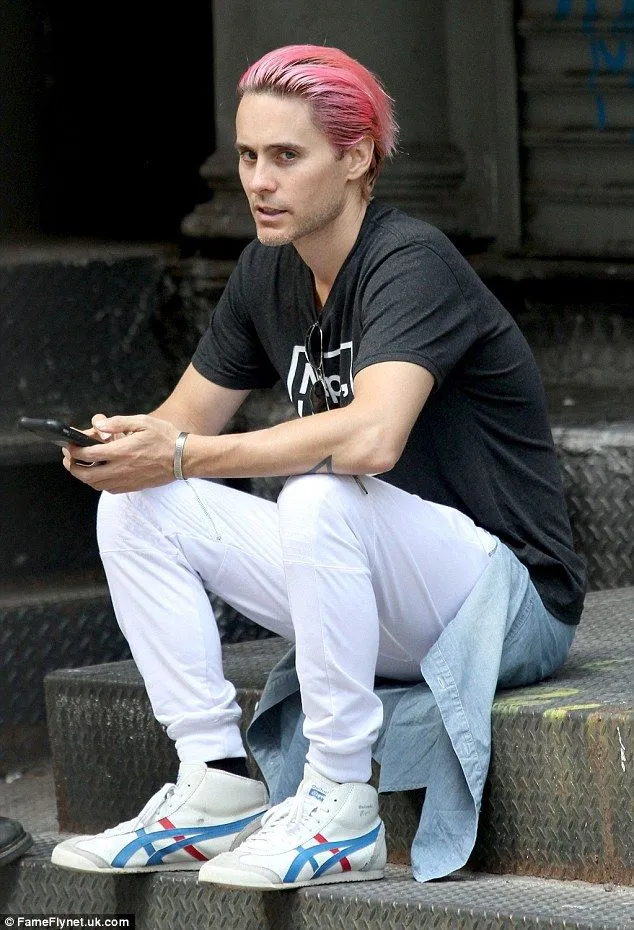 Casual Street Style Photo of Person Sitting on Stairs