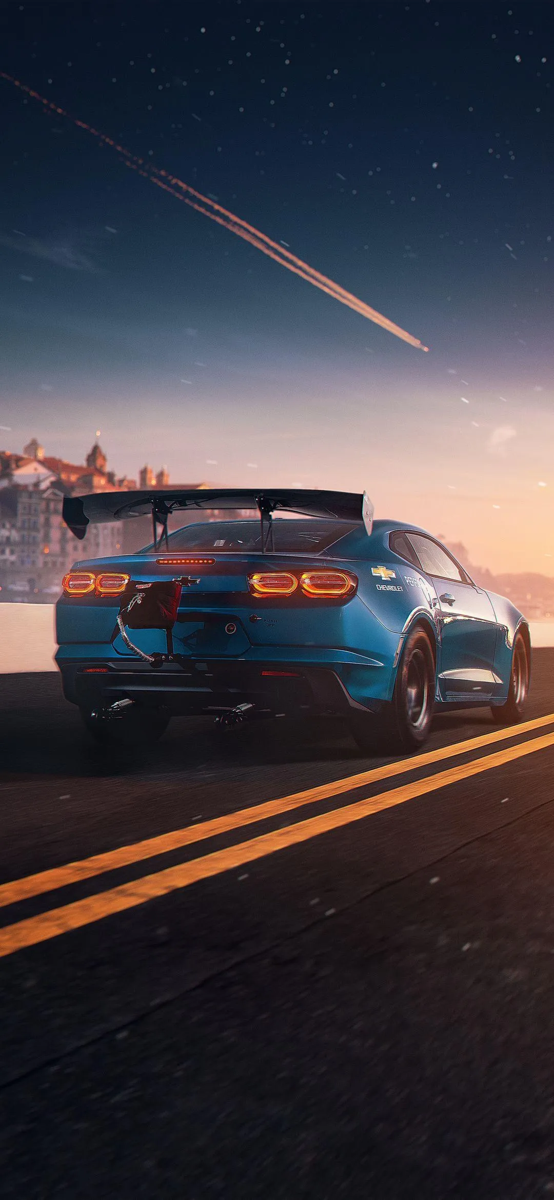 Chevrolet Race Car Drives Under Evening Sky on Highway