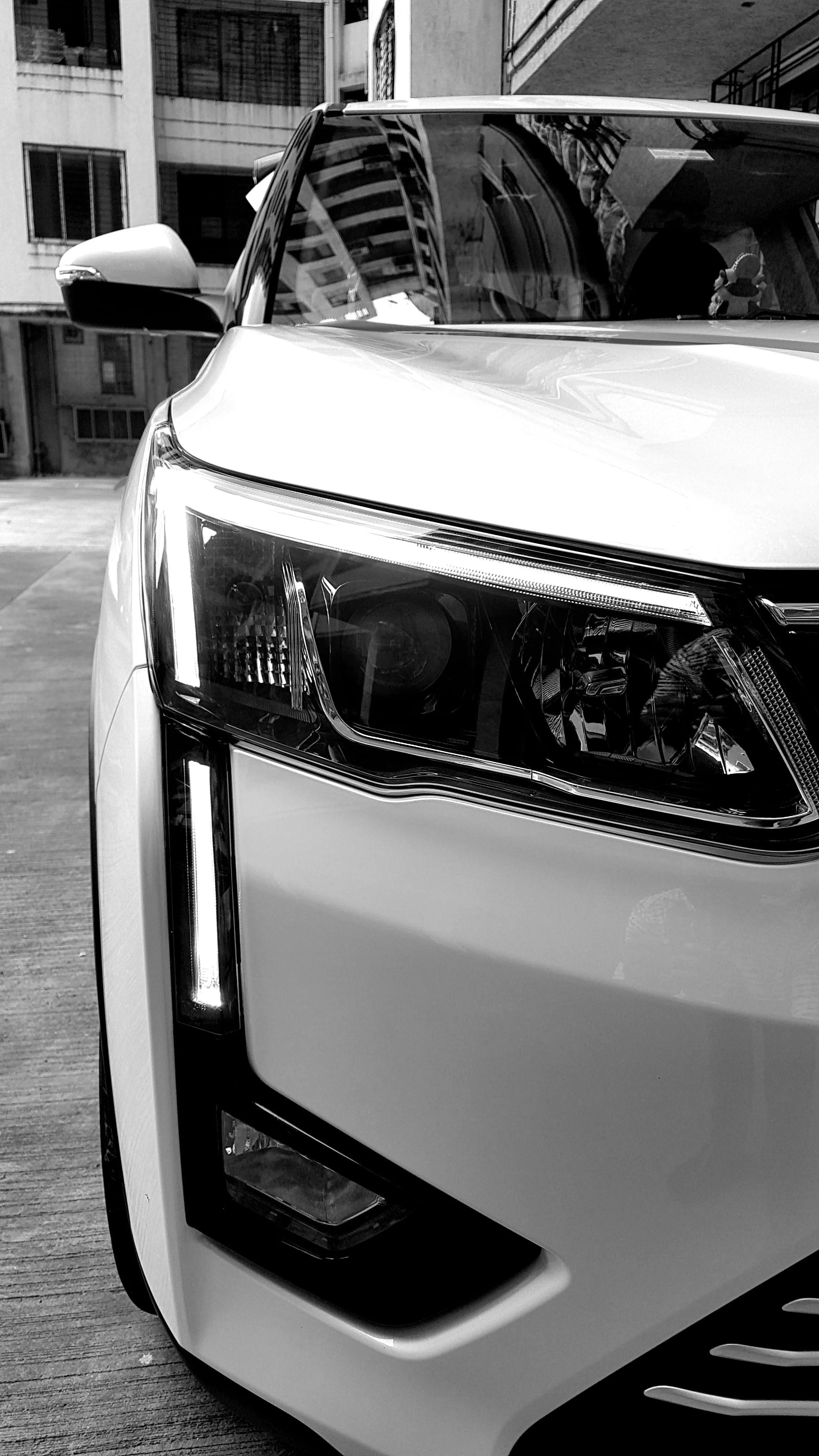 Chrome Car Front View with Bold Reflective Surface