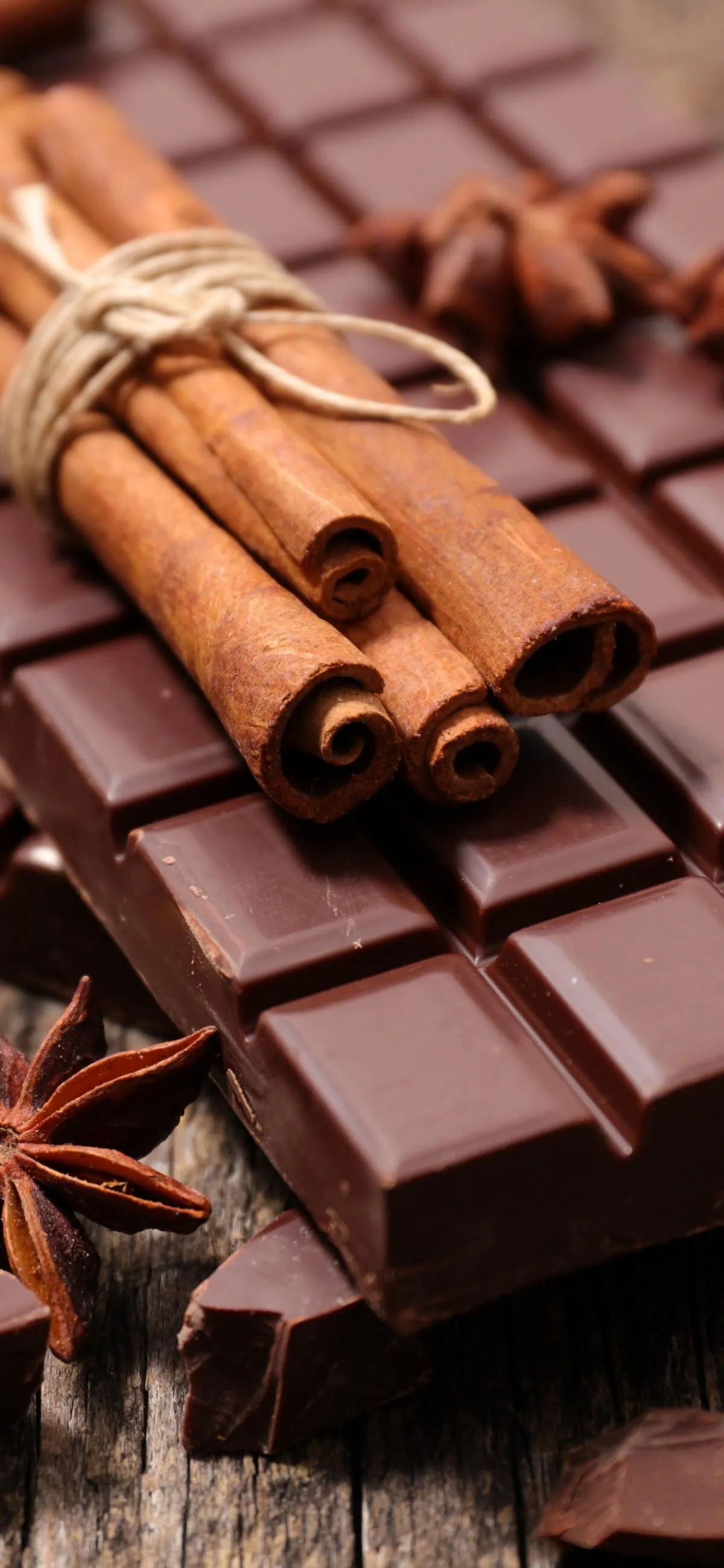 Cinnamon Sticks and Chocolate Bar in Rustic Mood Wallpaper