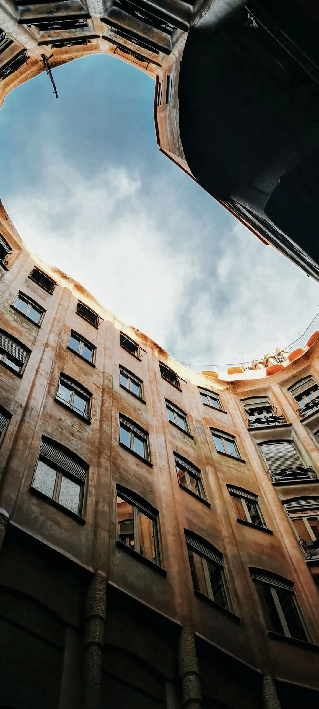 City Buildings Framing Sky from Ground Perspective Wallpaper